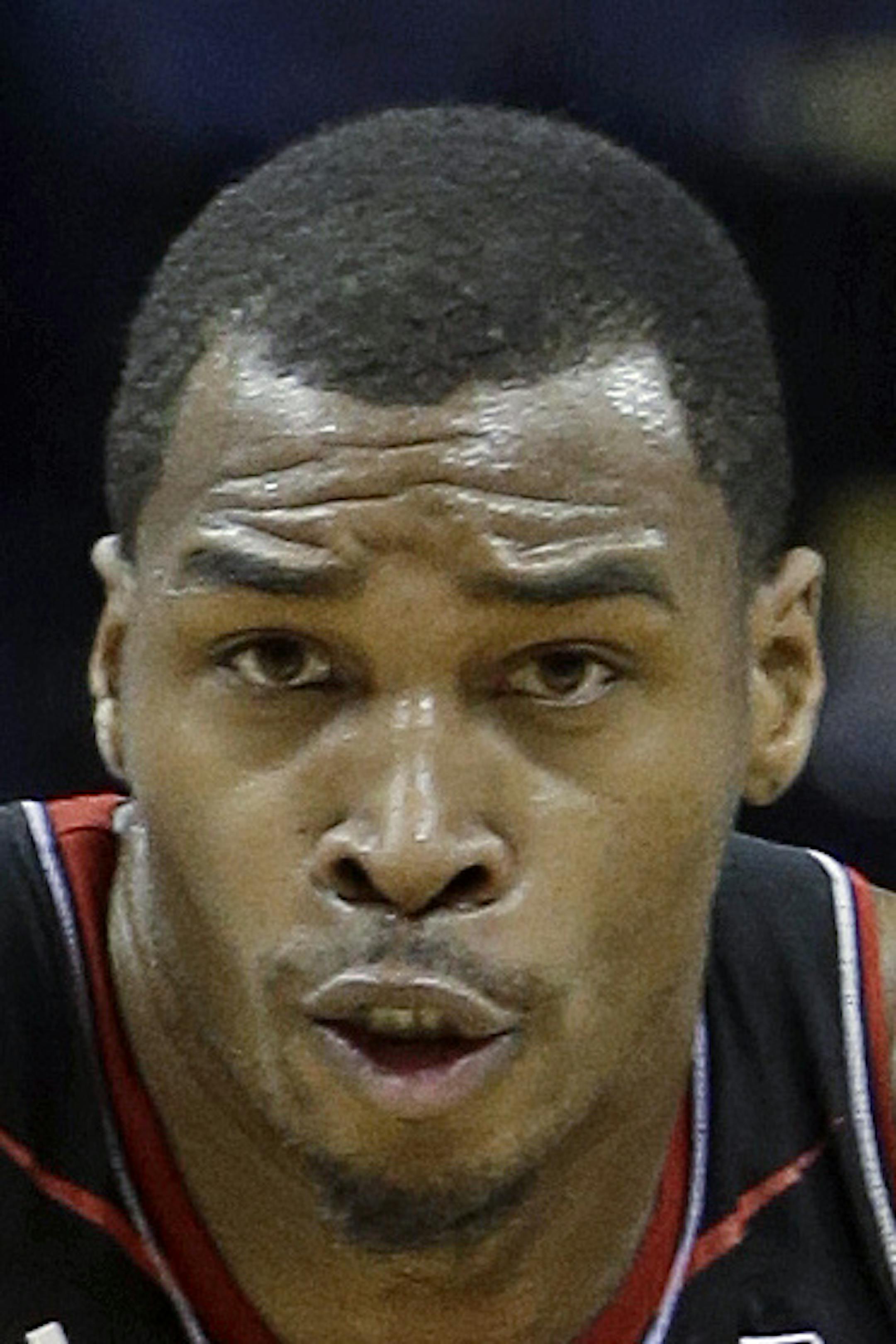 Cincinnati guard Sean Kilpatrick (23) drives past Memphis guard Geron Johnson (55) in the second half of an NCAA college basketball game Saturday, Jan. 4, 2014, in Memphis, Tenn. Kilpatrick led Cincinnati with 18 points as Cincinnati won 69-53. (AP Photo/Mark Humphrey) ORG XMIT: TNMH106