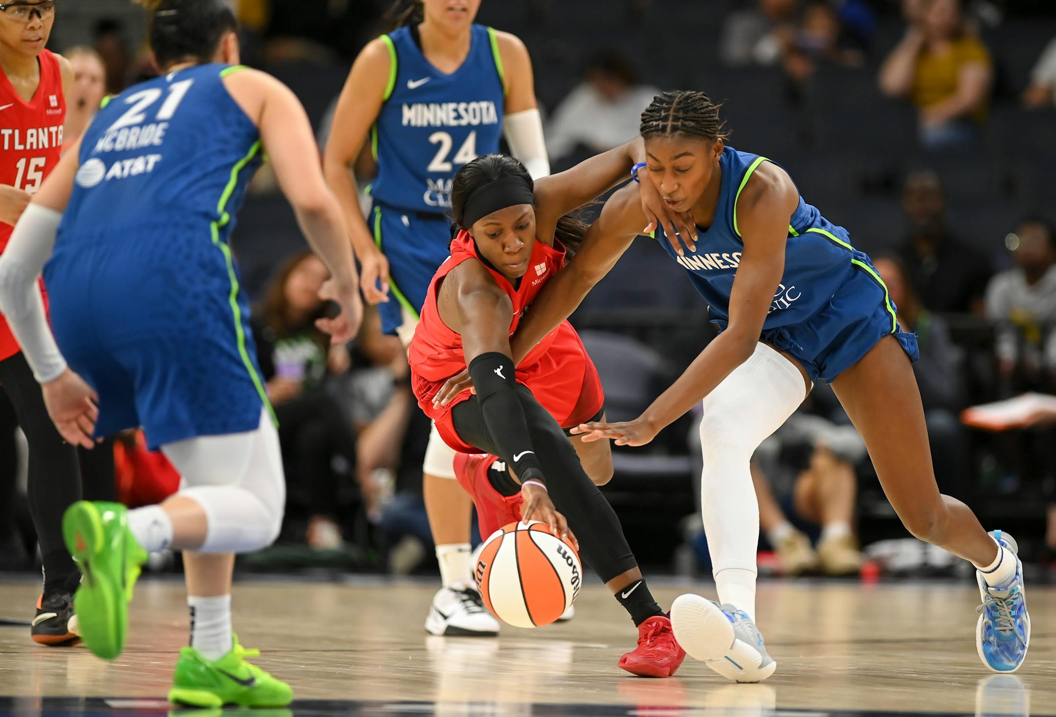 Atlanta Dream guard Rhyne Howard strips the ball from Minnesota Lynx forward Diamond Miller in the second half