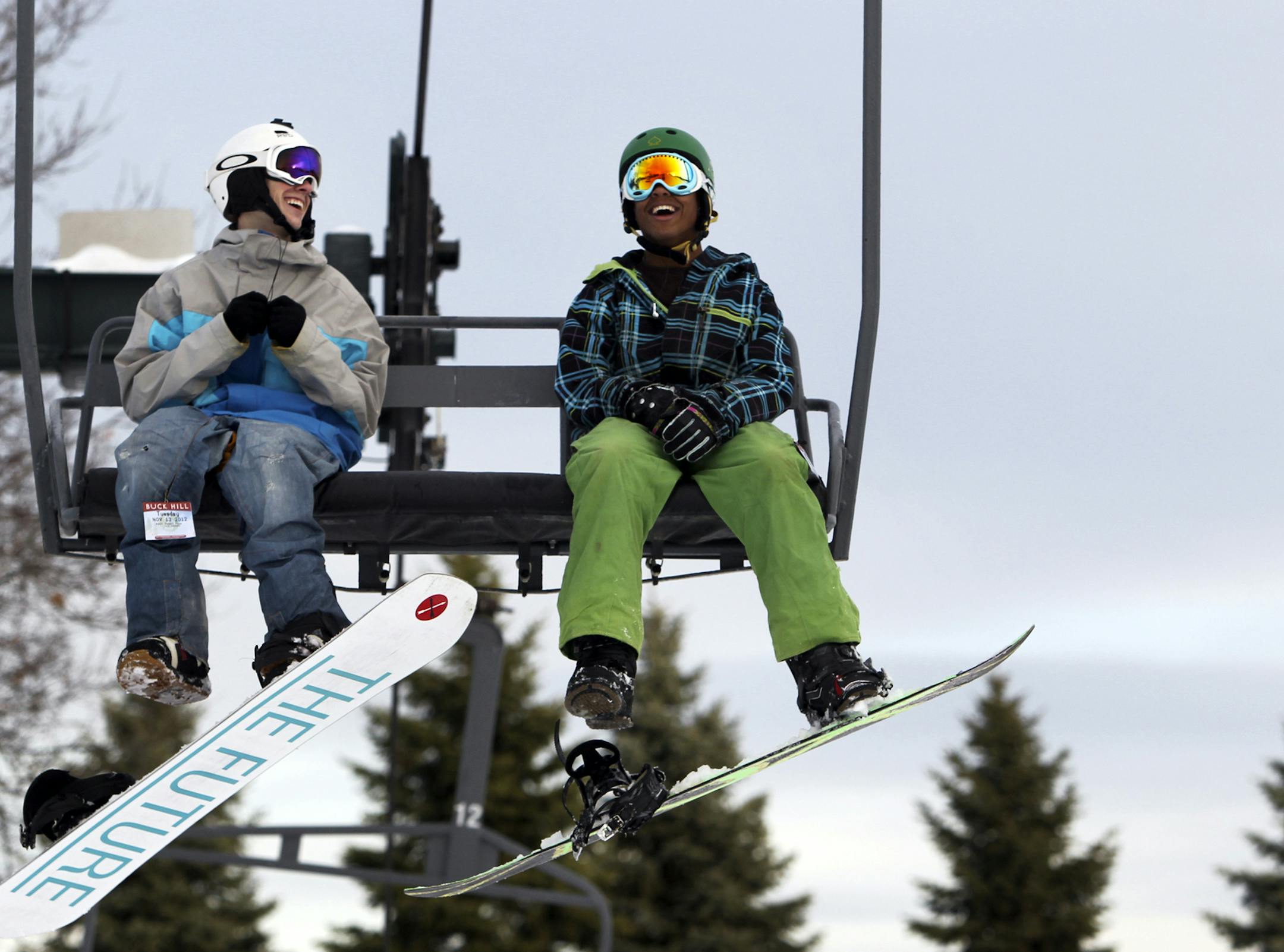 Snow boarders Jack Brenner, left, and Eric Murphy, right, both of Lakeville, were thrilled to be back on the slopes as Buck Hill opened to boarders and skiers with a 6-12 inch base and two runs open Tuesday, Nov. 13, 2012, in Burnsville, MN."It's fun," Murphy said. "It's a great day."] (DAVID JOLES/STARTRIBUNE) djoles@startribune.com Buck Hill opened to boarders and skiers with a 6-12 inch base and two runs open Tuesday, Nov. 13, 2012, in Burnsville, MN.** Jack Brenner, Eric Murphy, cq ORG XMIT: