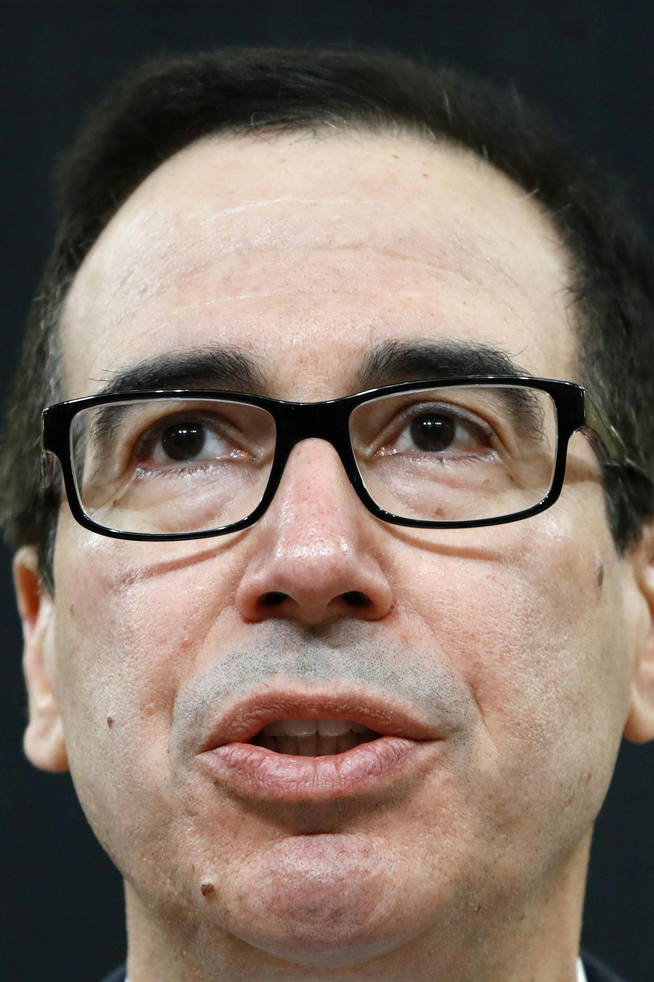 Treasury Secretary Steven Mnuchin testifies on the FY19 budget, during a House Ways and Means Committee hearing, Thursday, Feb. 15, 2018, on Capitol Hill in Washington. (AP Photo/Jacquelyn Martin)