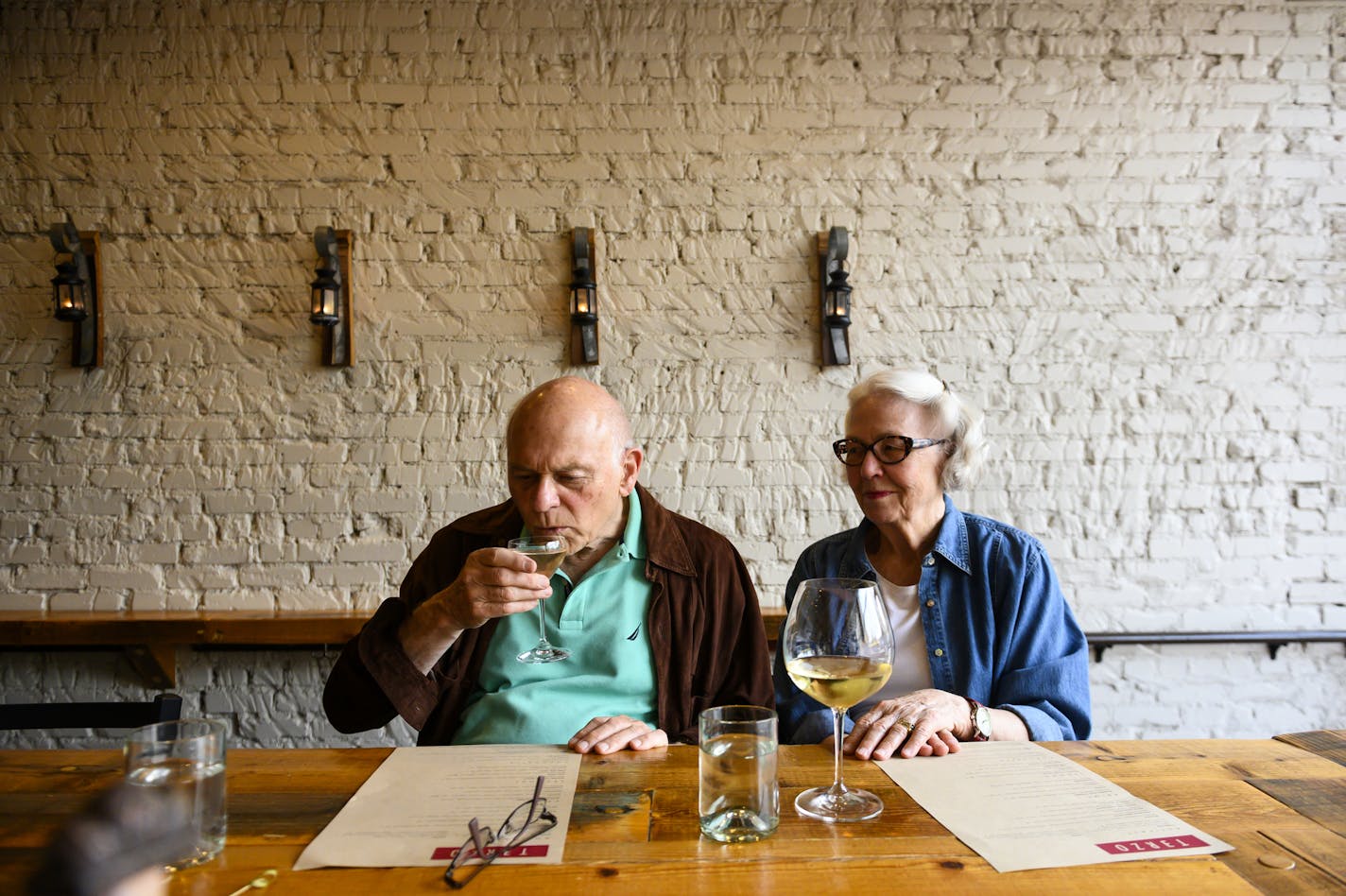 Warren Kelly took a sip of his dirty martini as he sat with his wife, Patty, at Terzo Thursday night. The contemporary Italian restaurant and wine bar is among two dozen eateries that have applied for full liquor licenses.