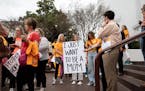 Protesters rally in support of in vitro fertilization at a demonstration outside the Alabama State House in Montgomery on Feb. 28. Alabama lawmakers a