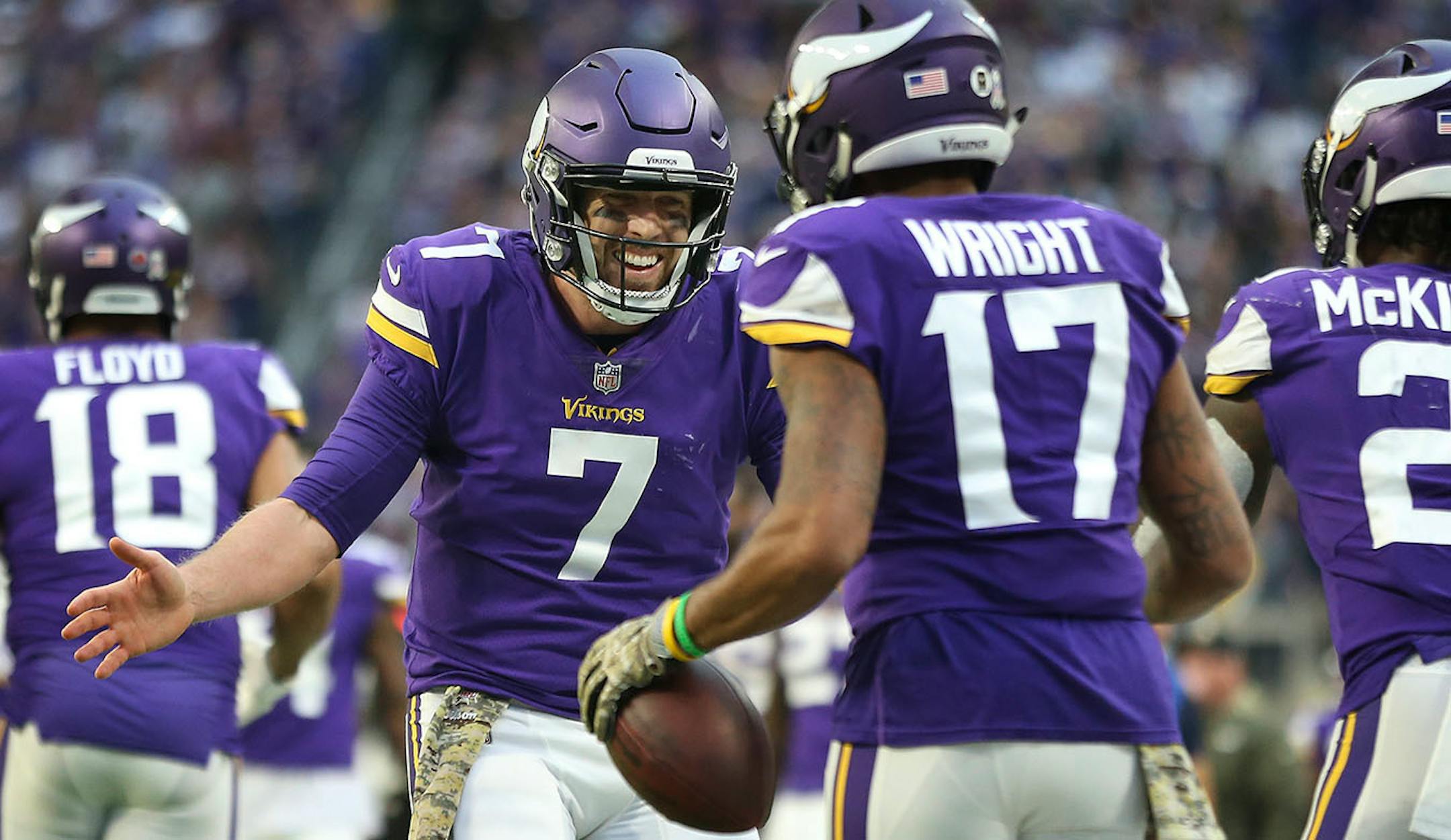 Vikings quarterback Case Keenum celebrated a long Adam Thielen touchdown with receiver Jarius Wright on Sunday.