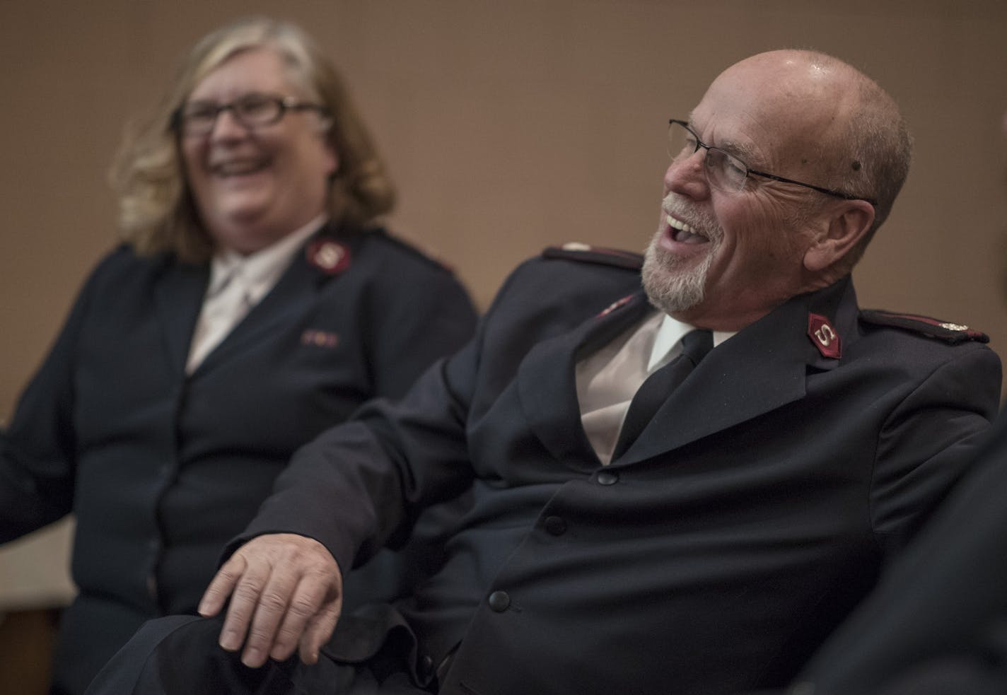 Salvation Army Lakewood Corps officers Majors Candy Curl left and her husband Jim Curl with Cadet Aaron Johnson at right during worship services at the Salvation Army Center Sunday December 10, 2017 in Maplewood MN.] JERRY HOLT &#xef; jerry.holt@startribune.com