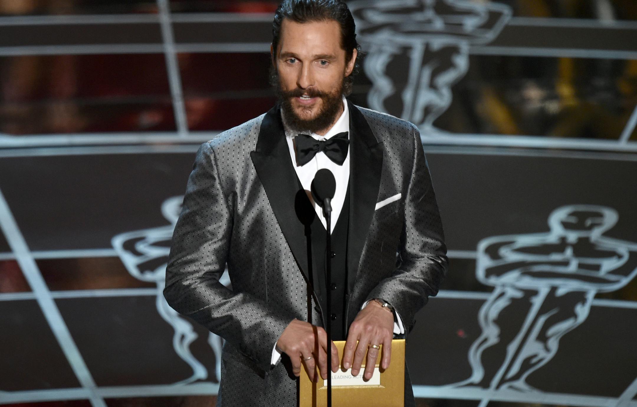 Matthew McConaughey presents the award for best actress in a leading role at the Oscars on Sunday, Feb. 22, 2015, at the Dolby Theatre in Los Angeles. (Photo by John Shearer/Invision/AP)