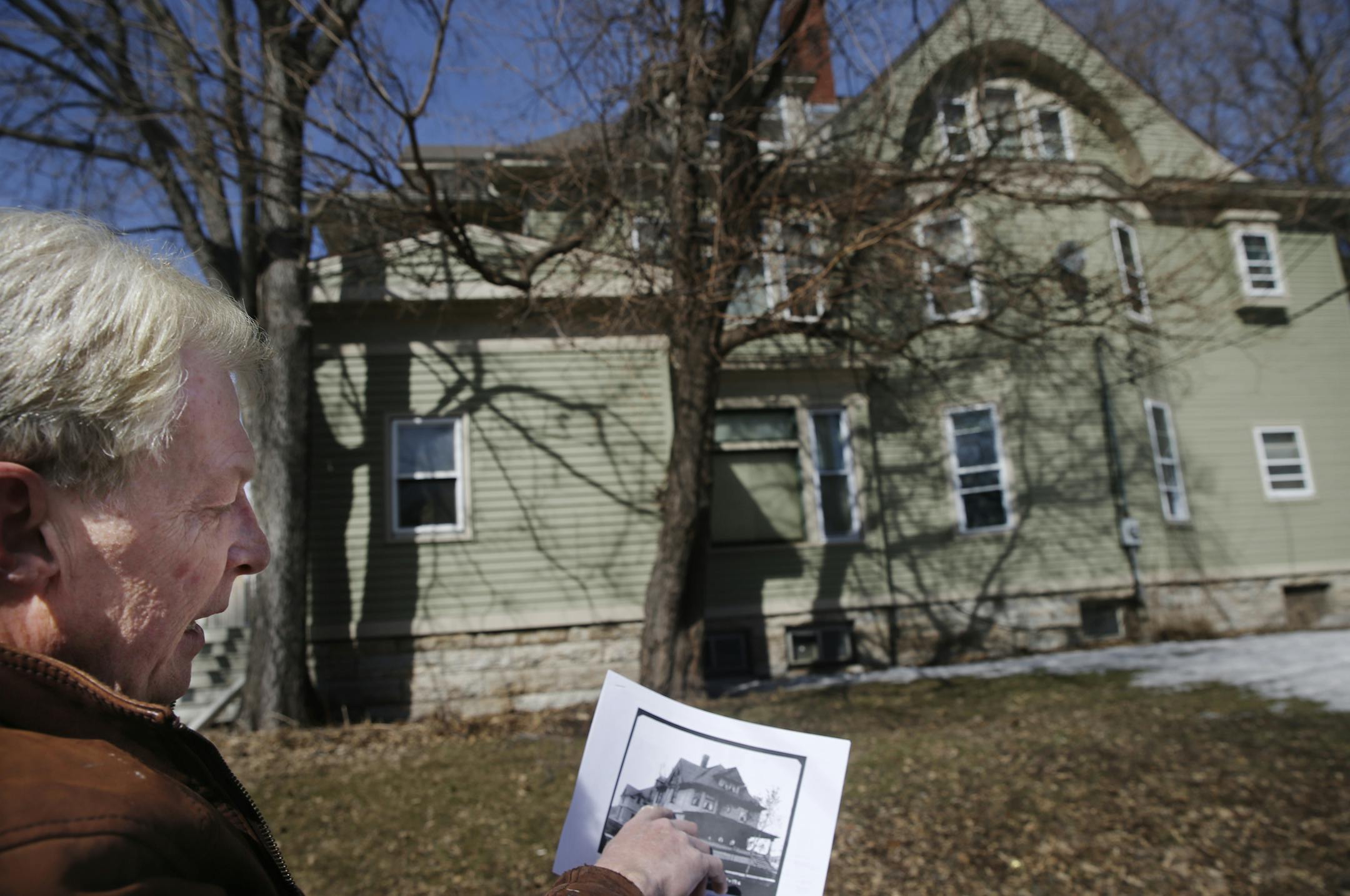 Owner Michael Crow has submitted a proposal to tear down an Uptown home to make way for a 44-unit apartment building. He pointed out that there are few details left that would make it a good example of a master builder T.P. Healy home, of which there are 140 left. For exampe, tlhe original front porch is long gone. Historic preservation advocates say the building should be saved.]richard.tsong-taatarii/rtsong-taatarii@startribune.com