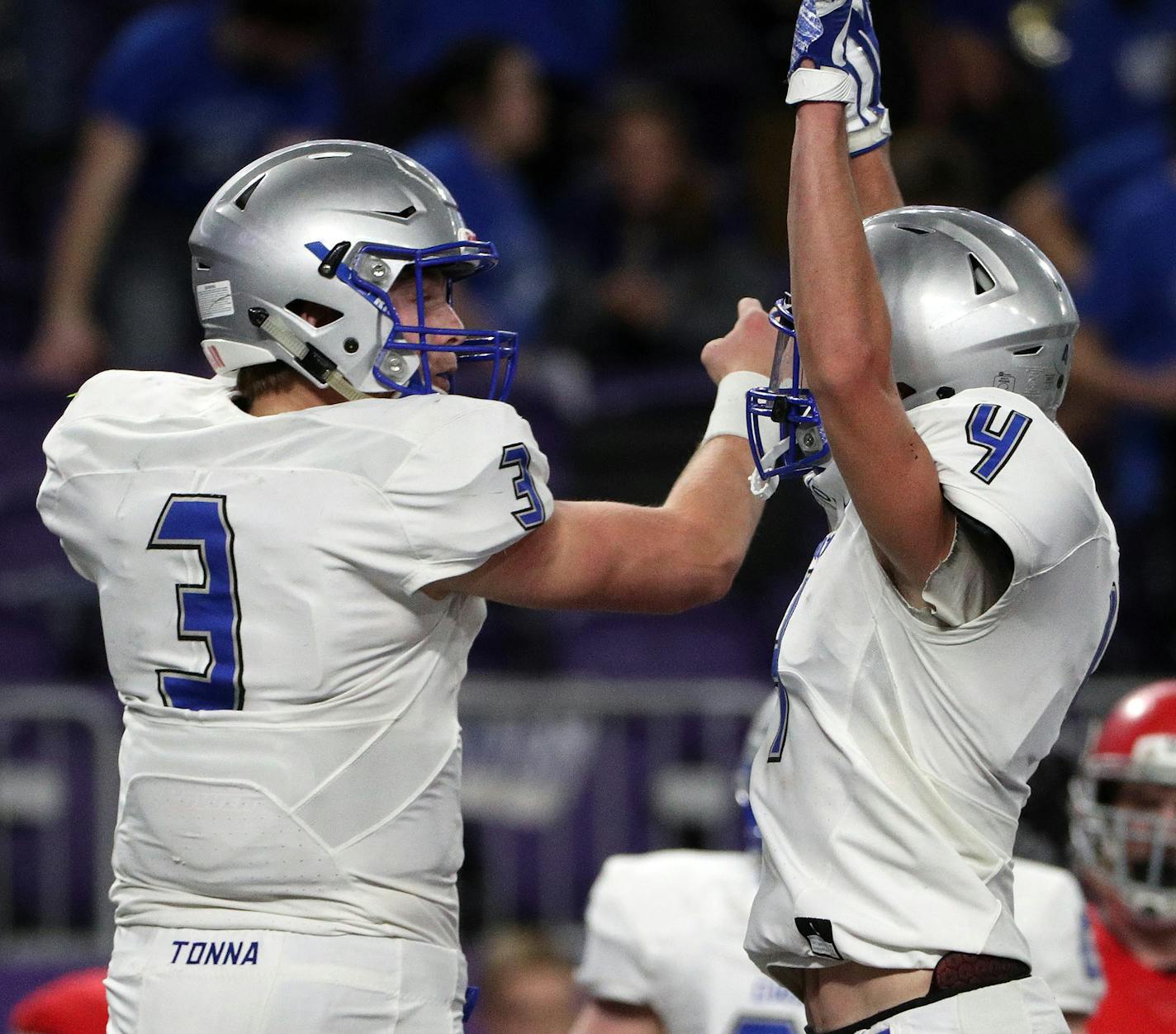 Owatonna High School quarterback Abe Havelka (3) celebrated with Owatonna High School wide receiver Alex Raichle (4) after Havelka scored a touchdown in the first half. ] ANTHONY SOUFFLE &#xef; anthony.souffle@startribune.com Game action from a Class 5A championship football game between Owatonna High School and Elk River High School Saturday, Nov. 25, 2017 at U.S. Bank Stadium in Minneapolis.