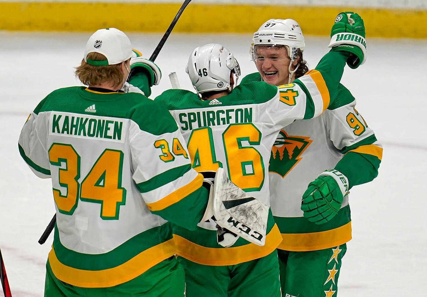 Minnesota Wild left wing Kirill Kaprizov (97), who scored three goals in the third period, got a hug from Minnesota Wild defenseman Jared Spurgeon (46) after the game. ] LEILA NAVIDI • leila.navidi@startribune.com