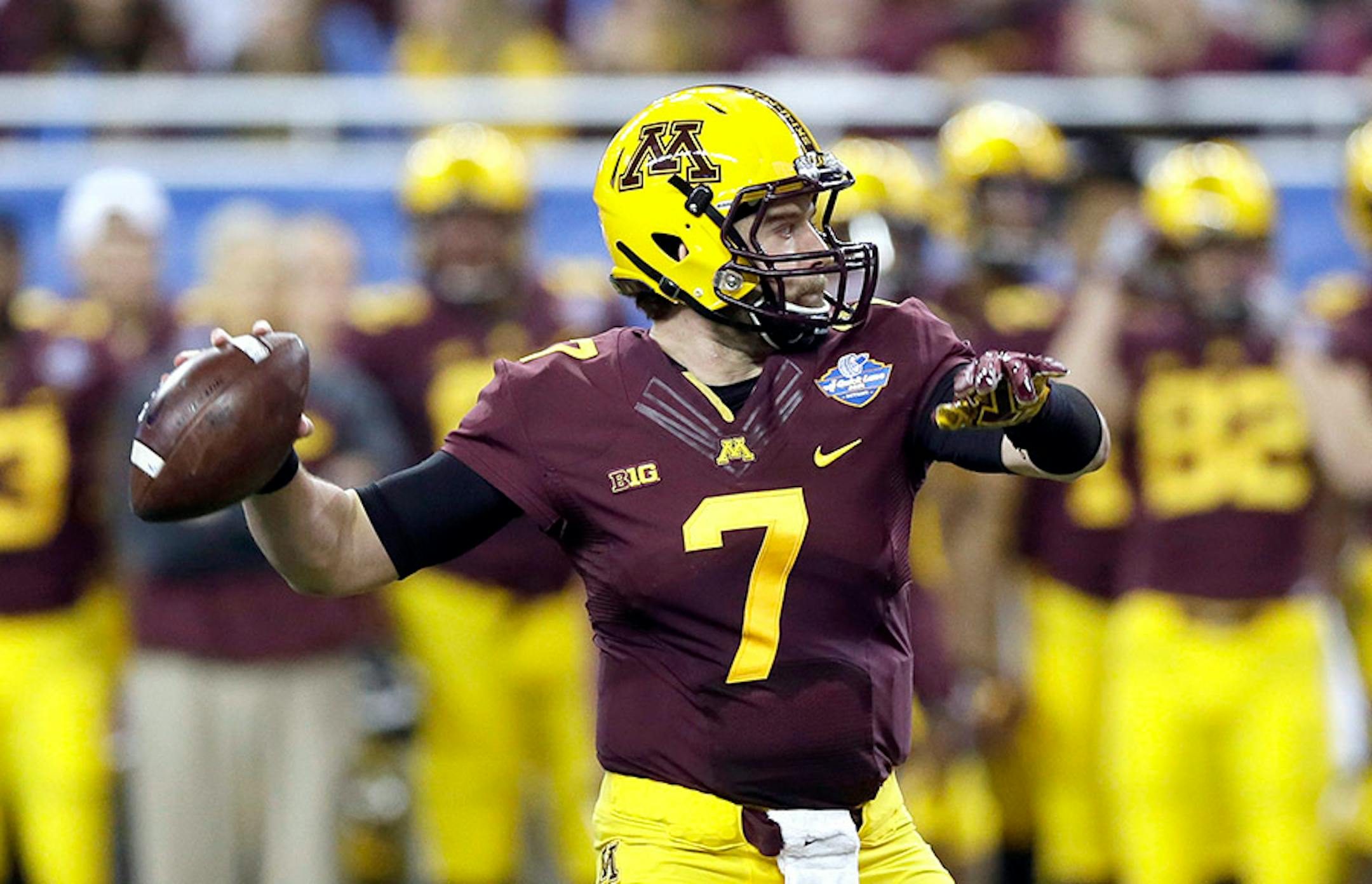 Minnesota quarterback Mitch Leidner throws during the first half of the Quick Lane Bowl NCAA college football game against Central Michigan, Monday, Dec. 28, 2015, in Detroit.