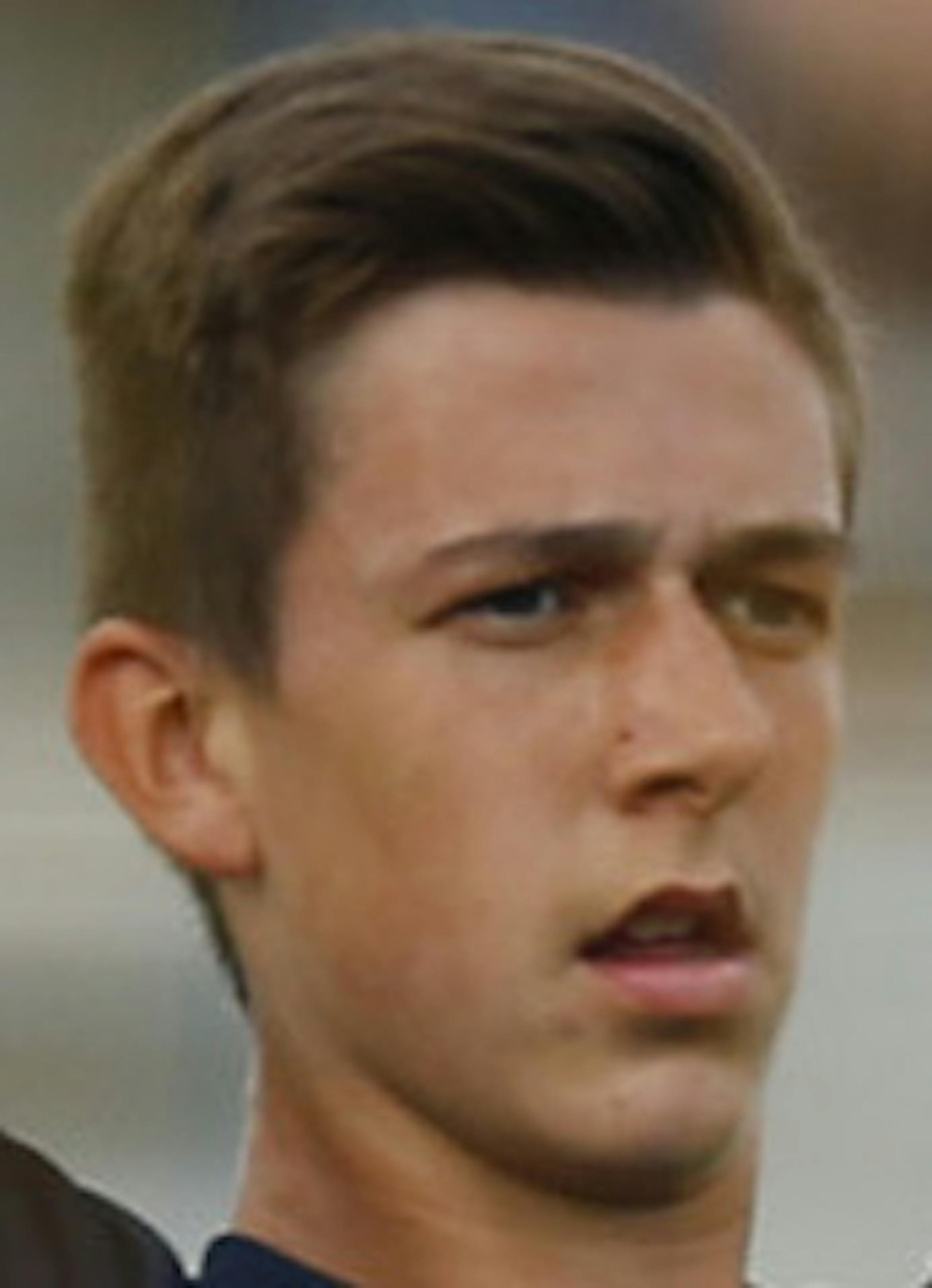 Prior Lake's Kyle Fenske signaled to a teammate where he was before before a corner kick in the first half Tuesday evening against Shakopee at West Junior High School in Shakopee. At right is his teammate Badaso Adem. ] JEFF WHEELER ‚Ä¢ jeff.wheeler@startribune.com The Prior Lake boy's soccer team lost 1-0 to Shakopee Tuesday evening, September 23, 2014 at West Junior High School in Shakopee.