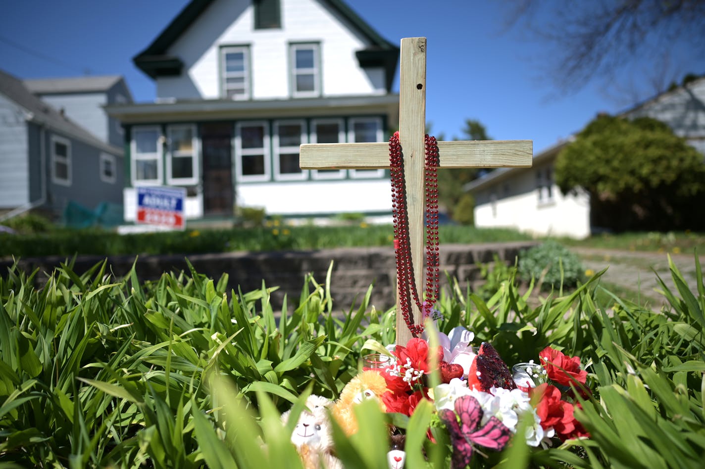 A memorial near the site of the fatal shooting of Douglas Lewis in St. Paul.