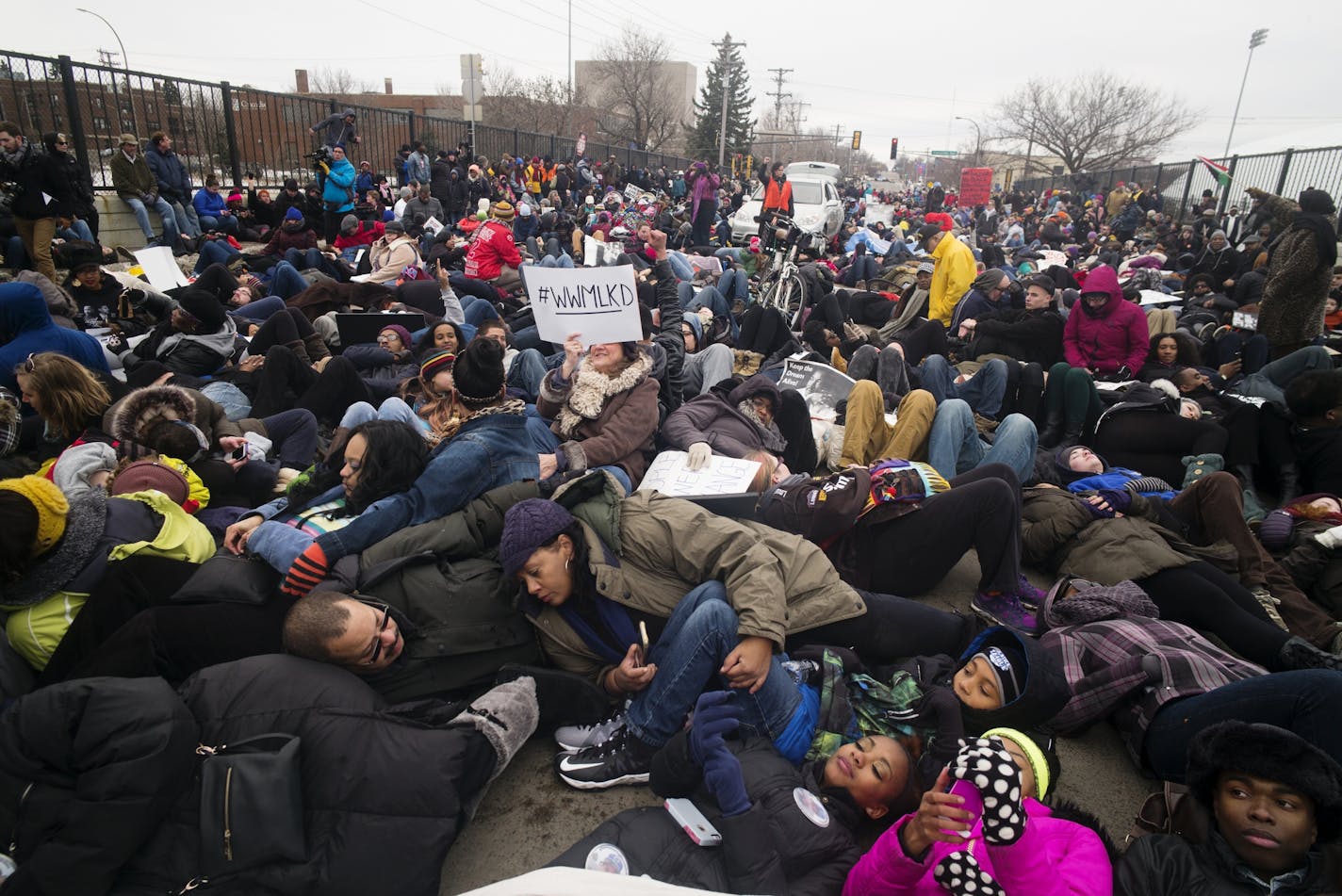 Black Lives Matter Minneapolis held an MLK march from Snelling and University in St. Paul to the Capitol on Monday. They "died in" on an I-94 overpass along the way.