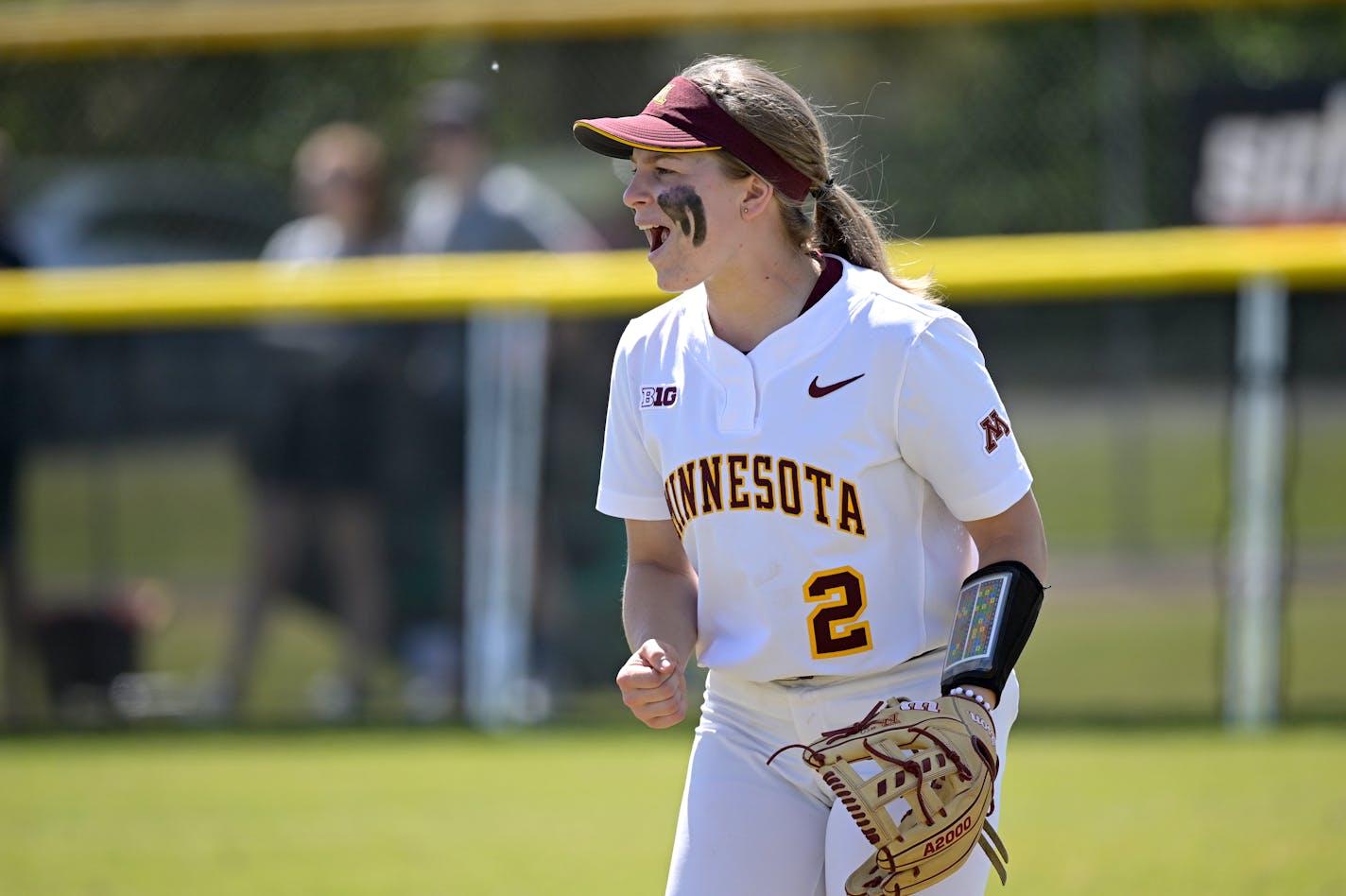 Minnesota outfielder Sydney Strelow (2) reacts to a play during an NCAA college softball game against Rutgers on Friday, March 12, 2021, in Leesburg, Fla. (AP Photo