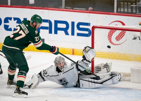 Wild center Nick Bjugstad lifted the puck over Los Angeles Kings goaltender Jonathan Quick for a goal on Jan. 28.