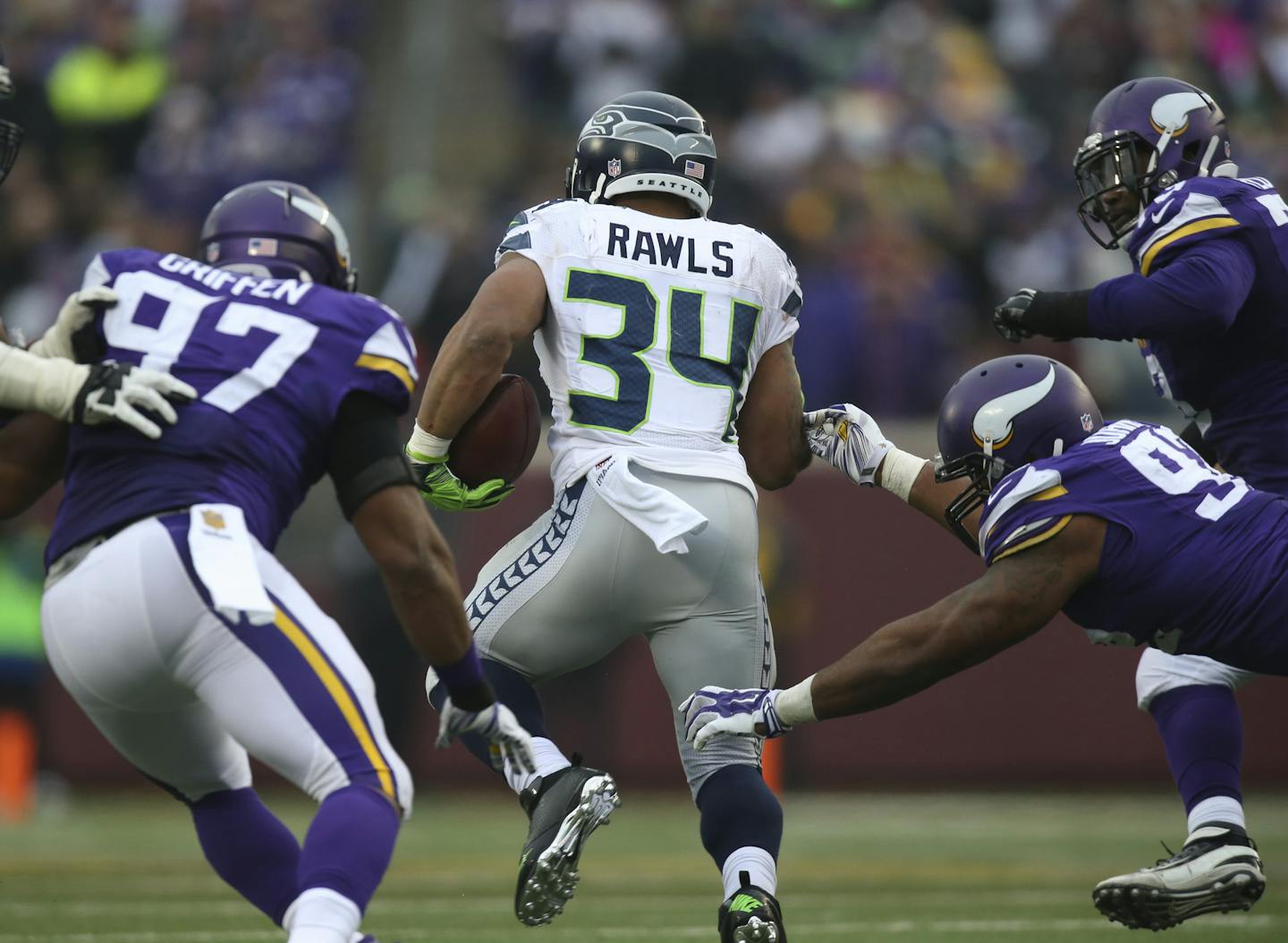 Seattle running back Thomas Rawls, an undrafted rookie who outrushed Adrian Peterson, found a hole for a 7-yard gain Sunday in the third quarter.