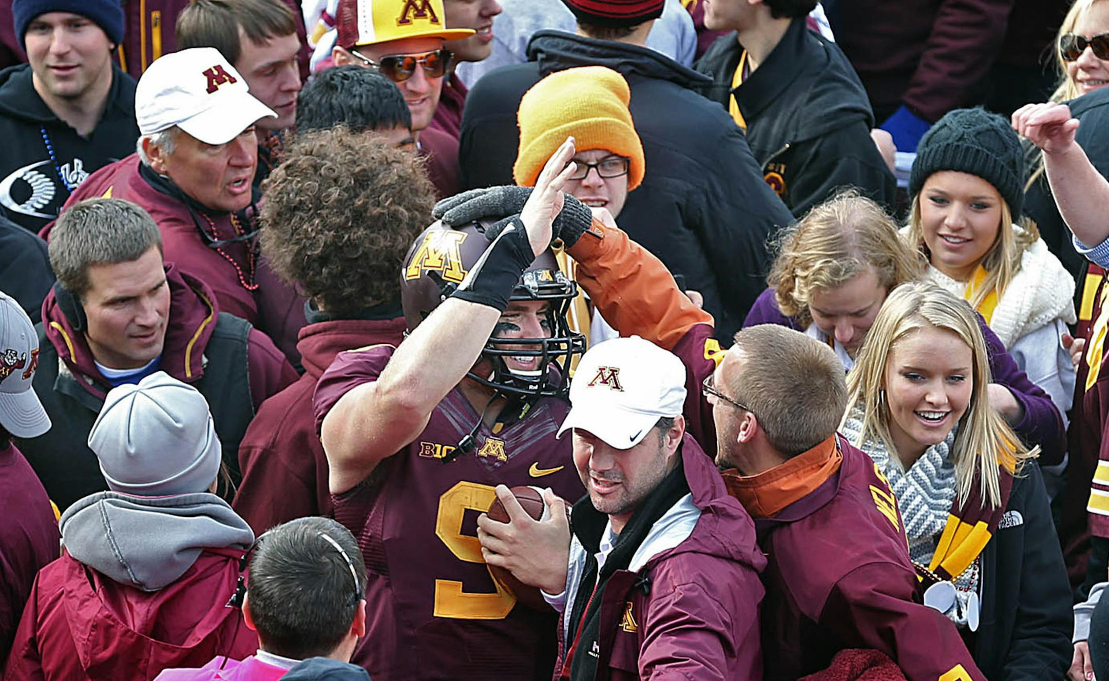 Minnesota quarterback Philip Nelson was mobbed by enthusiastic fans after the win over Nebraska. ] JIM GEHRZ &#x201a;&#xc4;&#xa2; jgehrz@startribune.com Minneapolis, MN / Oct 27, 2013, 11:00 AM BACKGROUND INFORMATION- The Minnesota Golden Gopher football team played the Nebraska Cornhuskers at TCF Bank Stadium. Minnesota won, 34-23. ORG XMIT: MIN1310261524552932