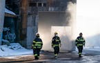 Firefighters worked to put out a fire inside a commercial building in north Minneapolis.