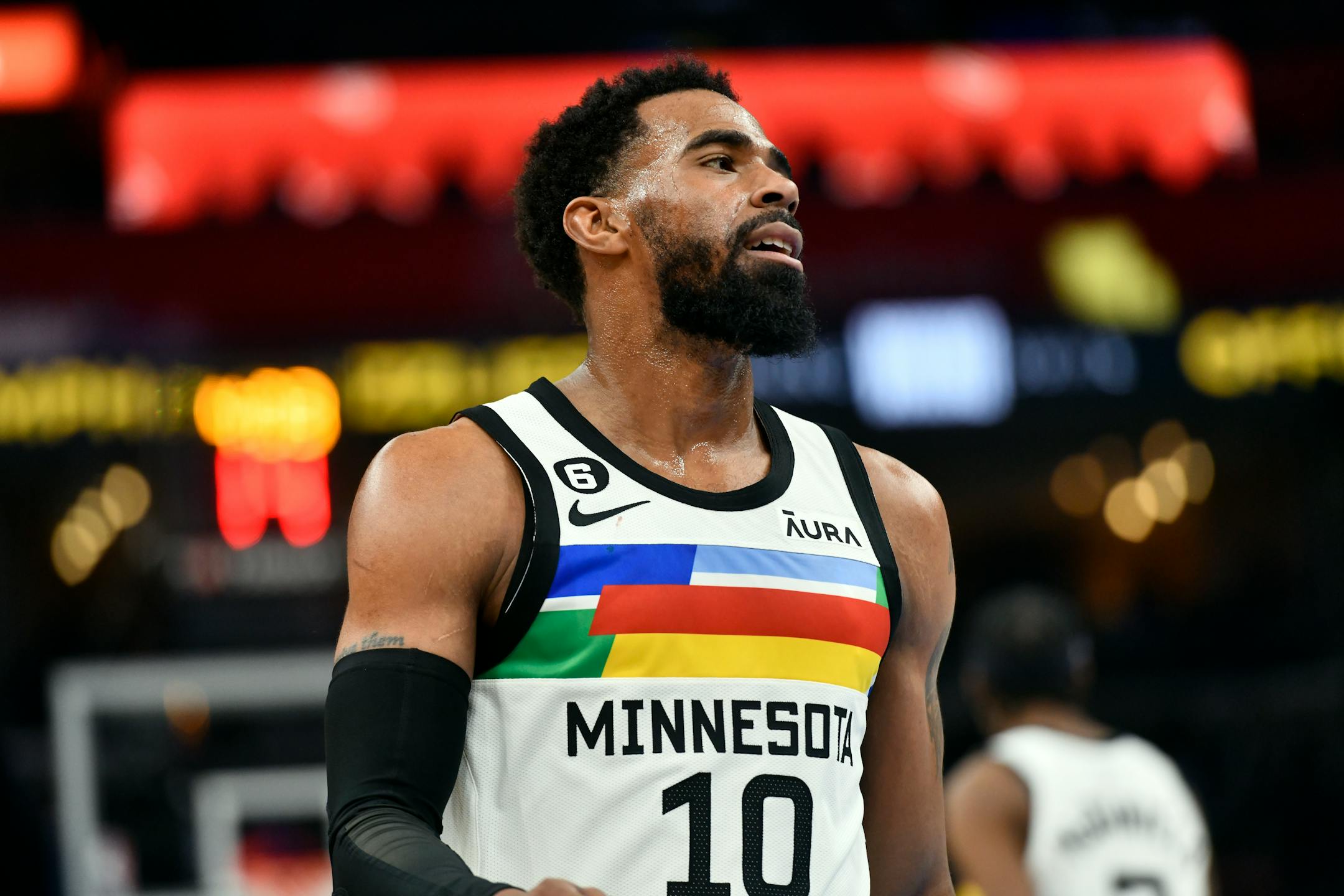 Minnesota Timberwolves guard Mike Conley (10) plays in the first half of an NBA basketball game against the Memphis Grizzlies, Friday, Feb. 10, 2023, in Memphis, Tenn. (AP Photo/Brandon Dill)