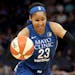The Minnesota Lynx Seimone Augustus (33) dribbles by the Phoenix Mercury's Diana Taurasi (3) during the first quarter Friday, June 1, 2018, at the Tar