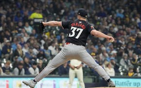 Twins starting pitcher Louie Varland throws during the first inning against the Brewers on Tuesday in Milwaukee.