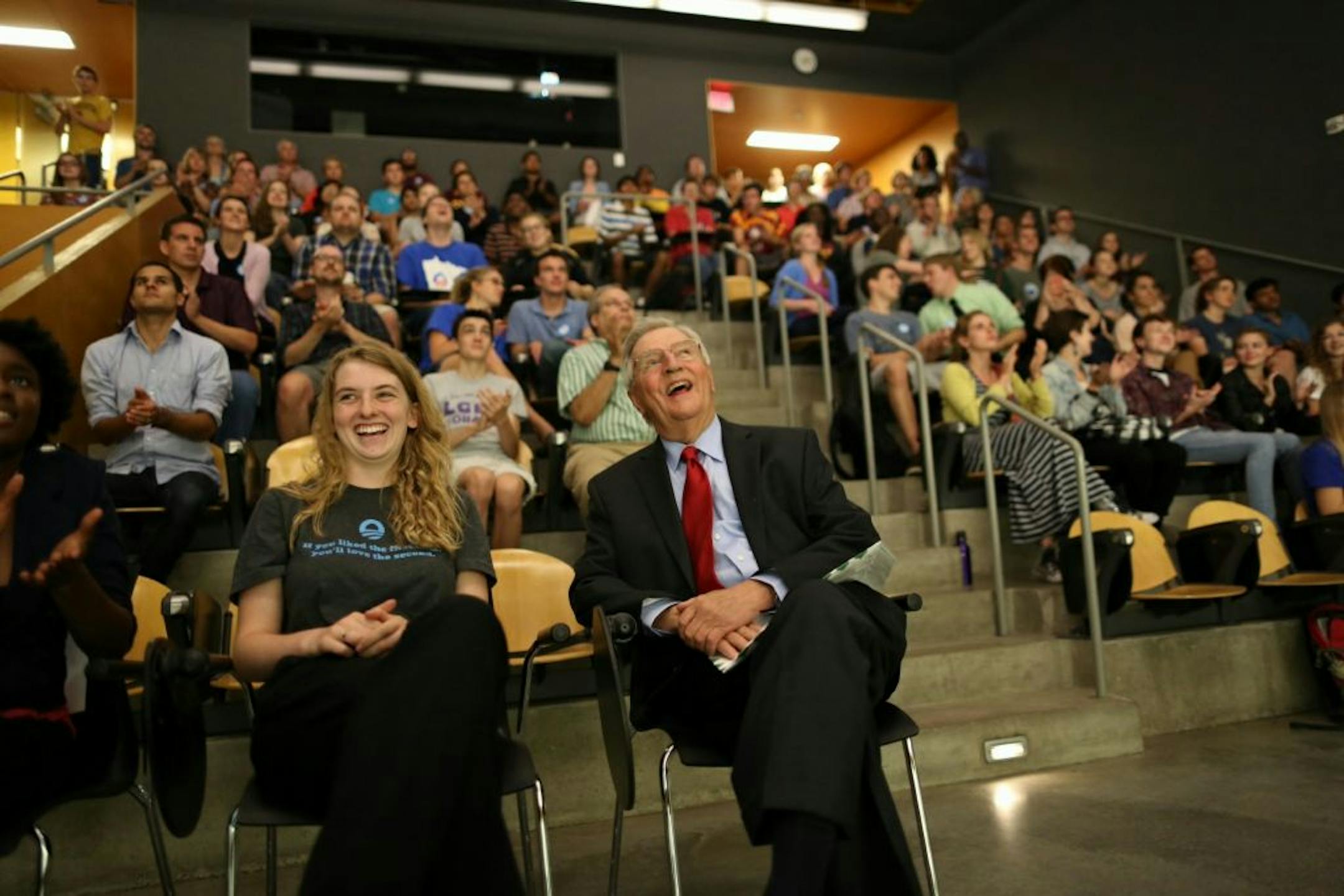 Former Vice President Walter Mondale laughed as he watched DNC coverage at a viewing party at the U on Thursday night.