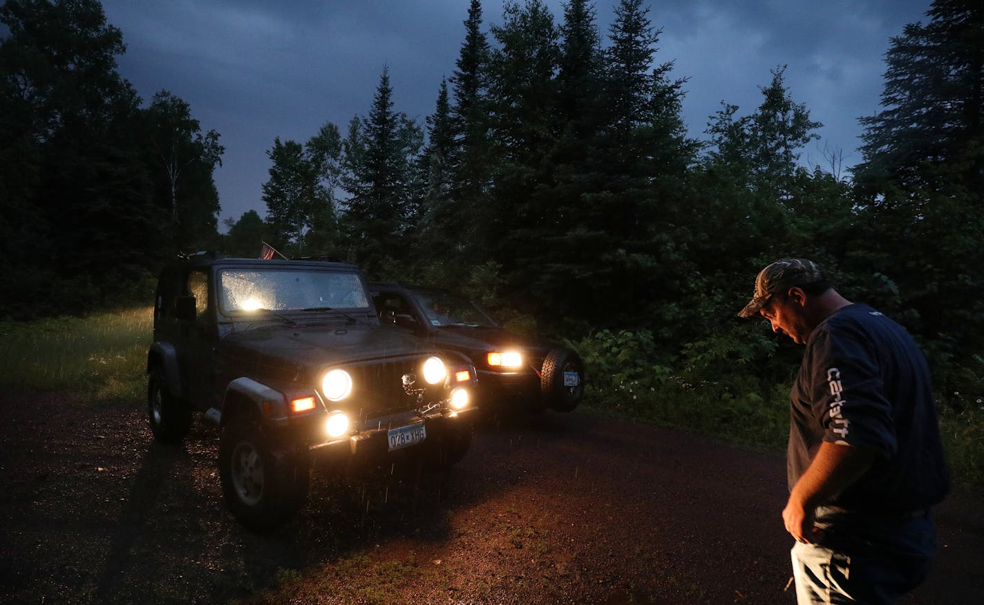 Scott Benolken paused along what would be part of the "Border-to-Border Touring Route" across northern Minnesota recreational areas.