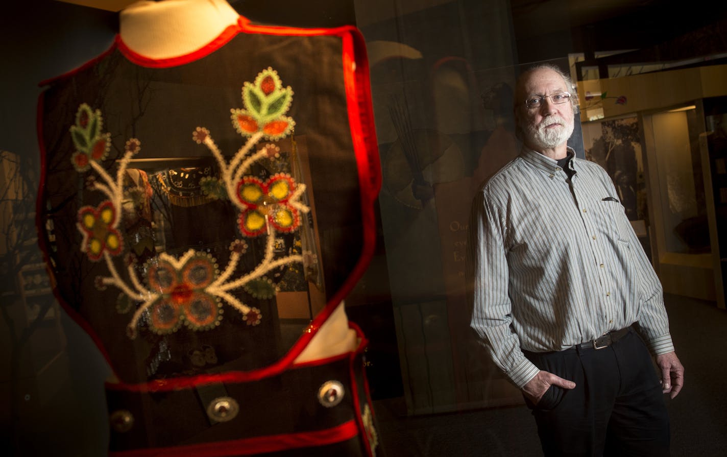 Bill Latady, curator of the Bois Forte Heritage Museum, stands beside an article of Chippewa mens' traditional regalia in the museum's exhibition room on Wednesday afternoon. ] (Aaron Lavinsky | StarTribune) aaron.lavinsky@startribune.com Nearly 100 years after campers in northern Minnesota found a cache of 54 items used in American Indian spiritual practices, the Minnesota Historical Society will return the 54 items to the Bois Forte Band, on the Iron Range. The items, including medicines, scro