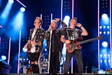 Gary LeVox, Jay DeMarcus and Joe Don Rooney of Rascal Flatts perform at the CMA Music Festival on June 6, 2019, in Nashville.