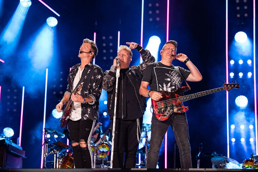 Gary LeVox, Jay DeMarcus and Joe Don Rooney of Rascal Flatts perform at the CMA Music Festival on June 6, 2019, in Nashville.
