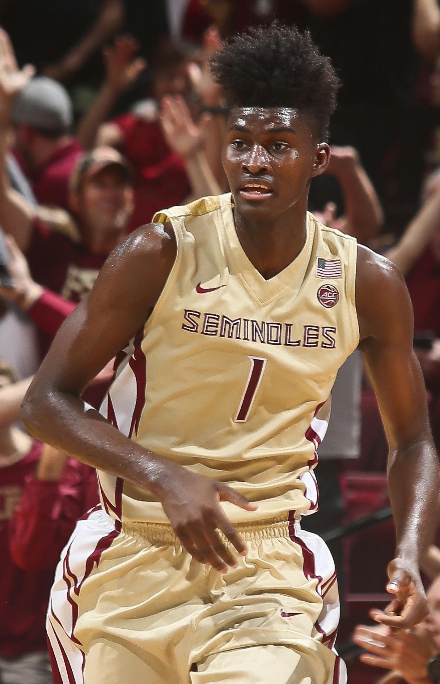 Florida State fans cheer for forward Jonathan Isaac (1), who led the game with 23 points and 7 blocks, after he made a three-point shot late in the second half of an NCAA college basketball game against Notre Dame on Wednesday, Jan. 18, 2017, in Tallahassee, Fla. Florida State won 83-80. (AP Photo/Phil Sears) ORG XMIT: FLPS115