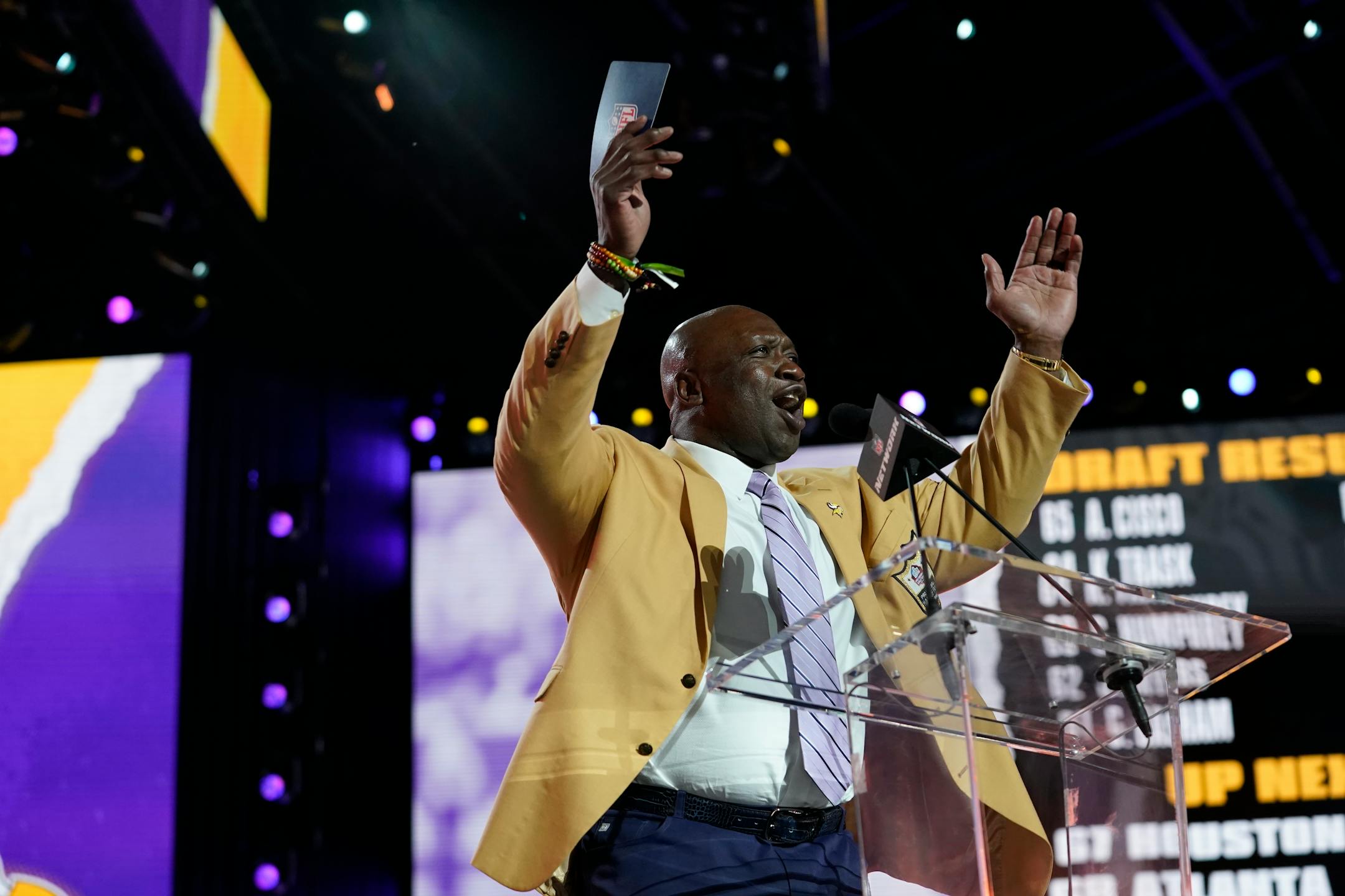 John Randle announces the Minnesota Vikings pick during the third round of the NFL Draft on Friday, April 30, 2021, in Cleveland. (AP Photo/Steve Luciano)
