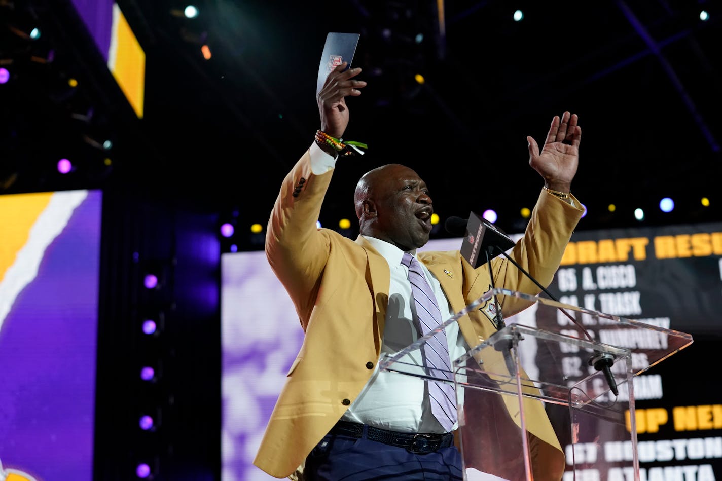 John Randle announces the Minnesota Vikings pick during the third round of the NFL Draft on Friday, April 30, 2021, in Cleveland. (AP Photo/Steve Luciano)