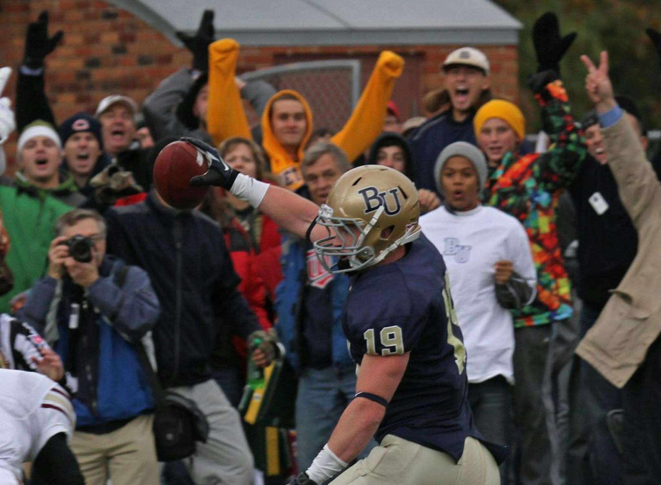 Bethel University's Mitch Hallstrom ran into the end zone for the winning conversion to beat Concordia.