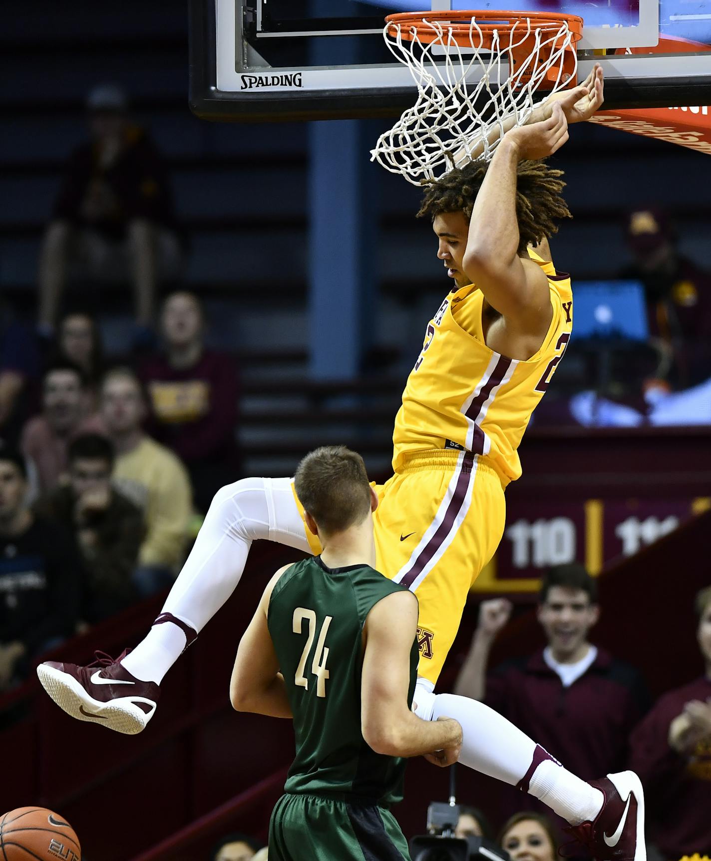 Minnesota Golden Gophers center Reggie Lynch (22) held onto the rim after dunking on Bemidji State in the first half Thursday. ] (AARON LAVINSKY/STAR TRIBUNE) aaron.lavinsky@startribune.com The University of Minnesota Golden Gophers men's basketball team played the Bemidji State Beavers on Thursday, Nov. 3, 2016 at Williams Arena in Minneapolis, Minn.