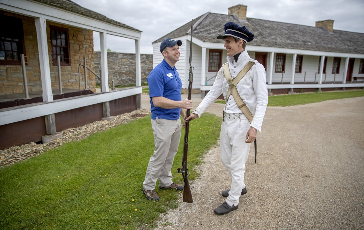 Chris Belland, the new program and outreach manager of veterans relations for the Minnesota Historical Society, chatted with Historical Interpreter Steven Nikodem, the job Belland used to do, Friday, May 24, 2019 in St. Paul, MN. ] ELIZABETH FLORES &#x2022; liz.flores@startribune.com