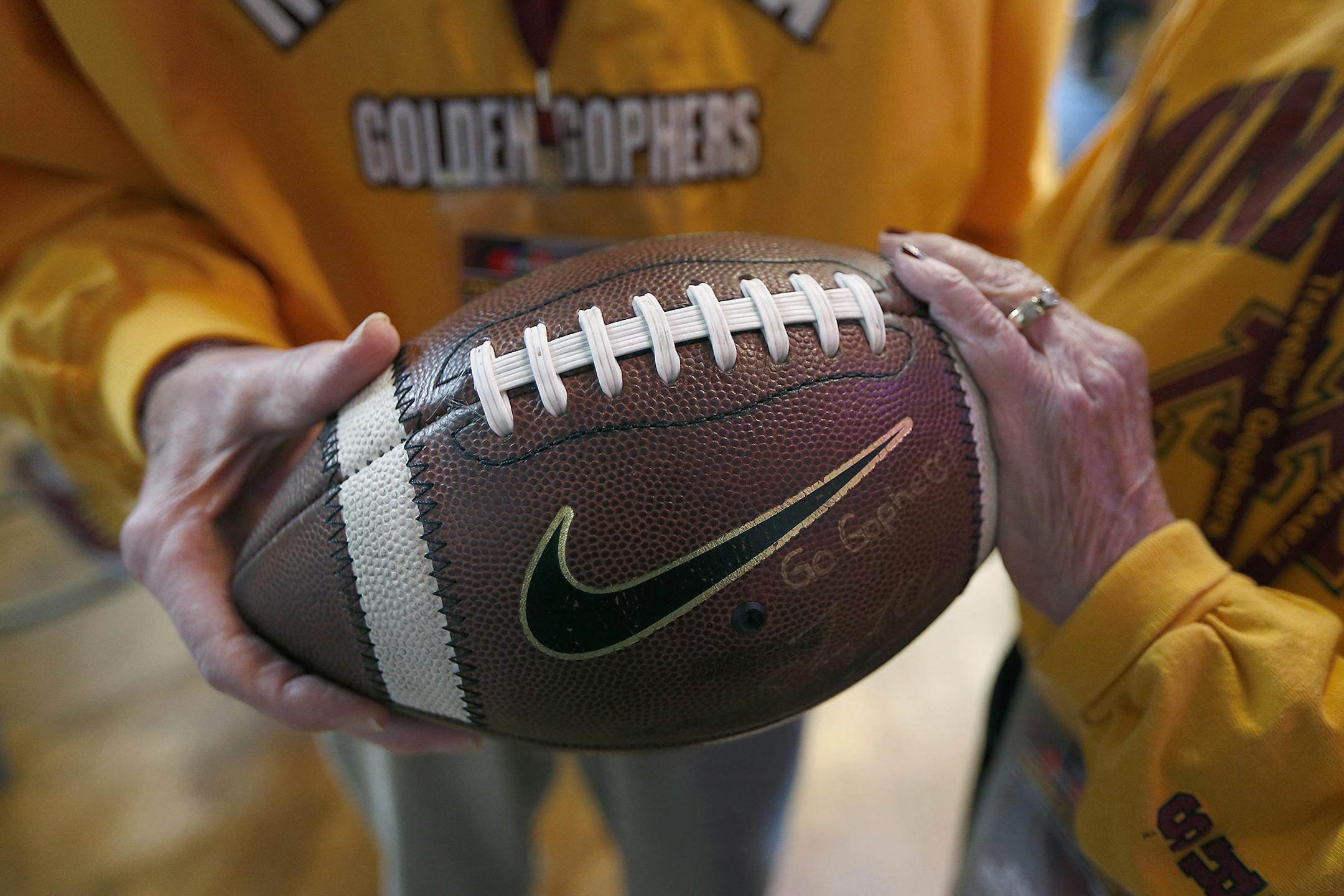 Minnesota head football coach Tracy Claeys made a surprise appearance as he presented first time bowl visitors Warren and Ardella Quarnstrom with a football during a breakfast, Tuesday, December 27, 2016 in San Diego, CA. The couple, both 91, made their first time football bowl trip from Marshall, MN. ] (ELIZABETH FLORES/STAR TRIBUNE) ELIZABETH FLORES &#x2022; eflores@startribune.com