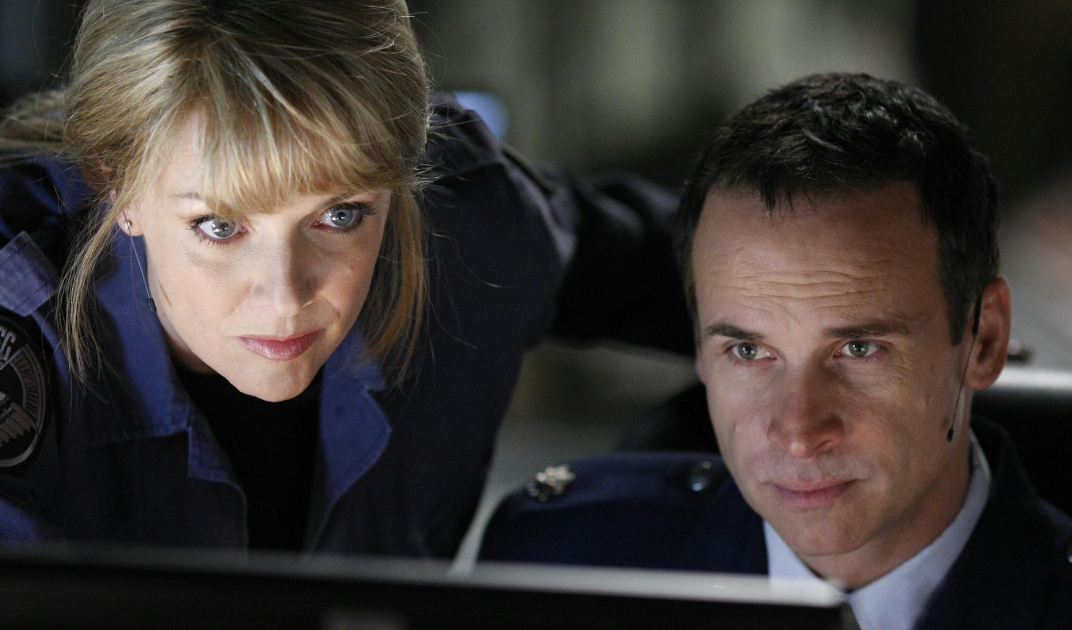 STARGATE ATLANTIS -- "Enemy at the Gate" Episode 520 --Pictured: (l-r) Amanda Tapping as Col. Samantha Carter, Colin Cunningham as Paul Davis -- SCI FI Channel Photo: Eike Schroter