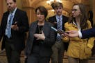 Reporters follow Sen. Amy Klobuchar, D-Minn., on Capitol Hill in Washington, Tuesday, Jan. 8, 2019, (AP Photo/Manuel Balce Ceneta)