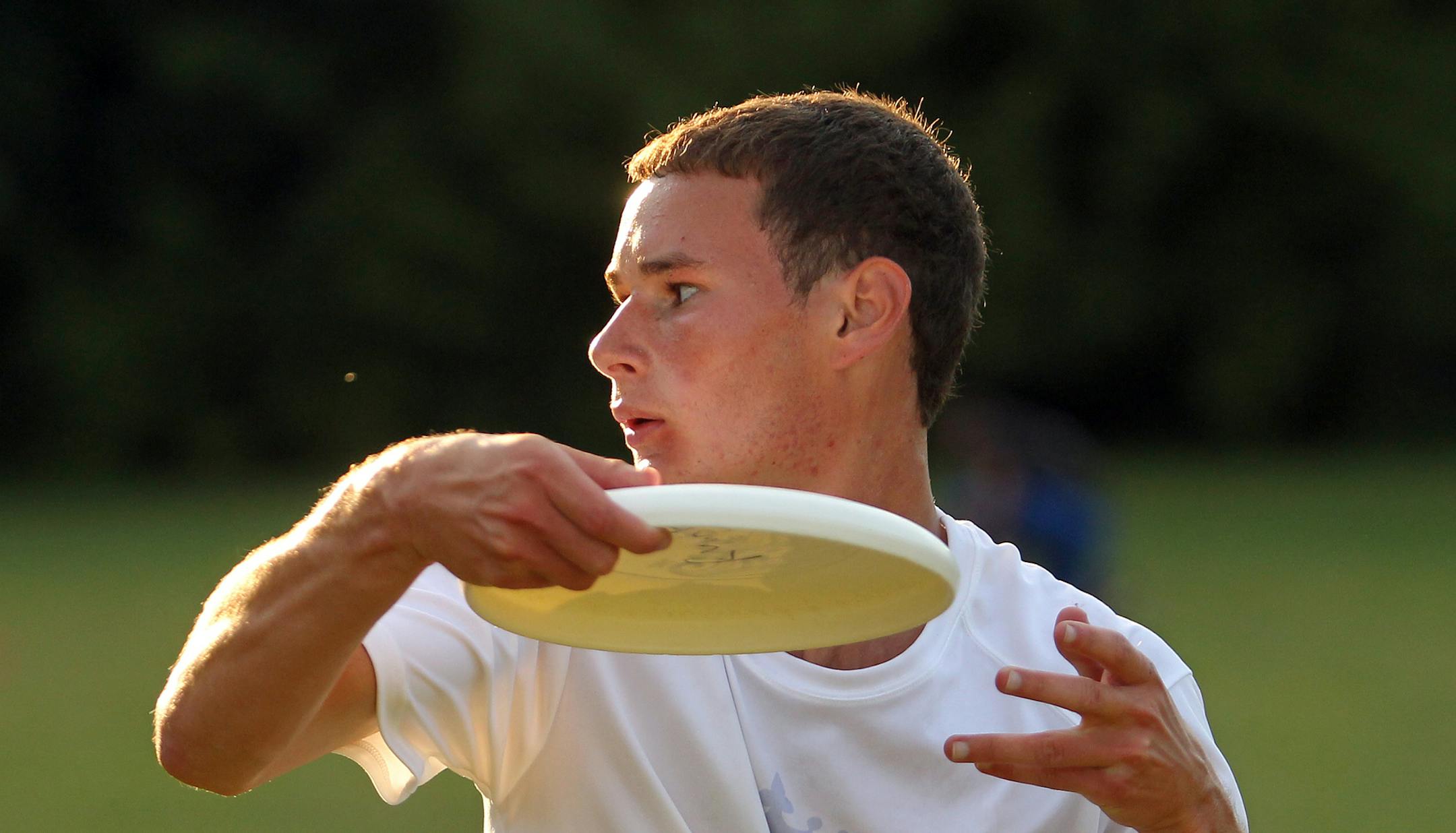 Ryan Franklin prepares to pass the disc during a practice for the sport ultimate at Edina High School in Edina, Minn., on Thursday, August 1, 2013. ] (ANNA REED/STAR TRIBUNE) anna.reed@startribune.com (cq)