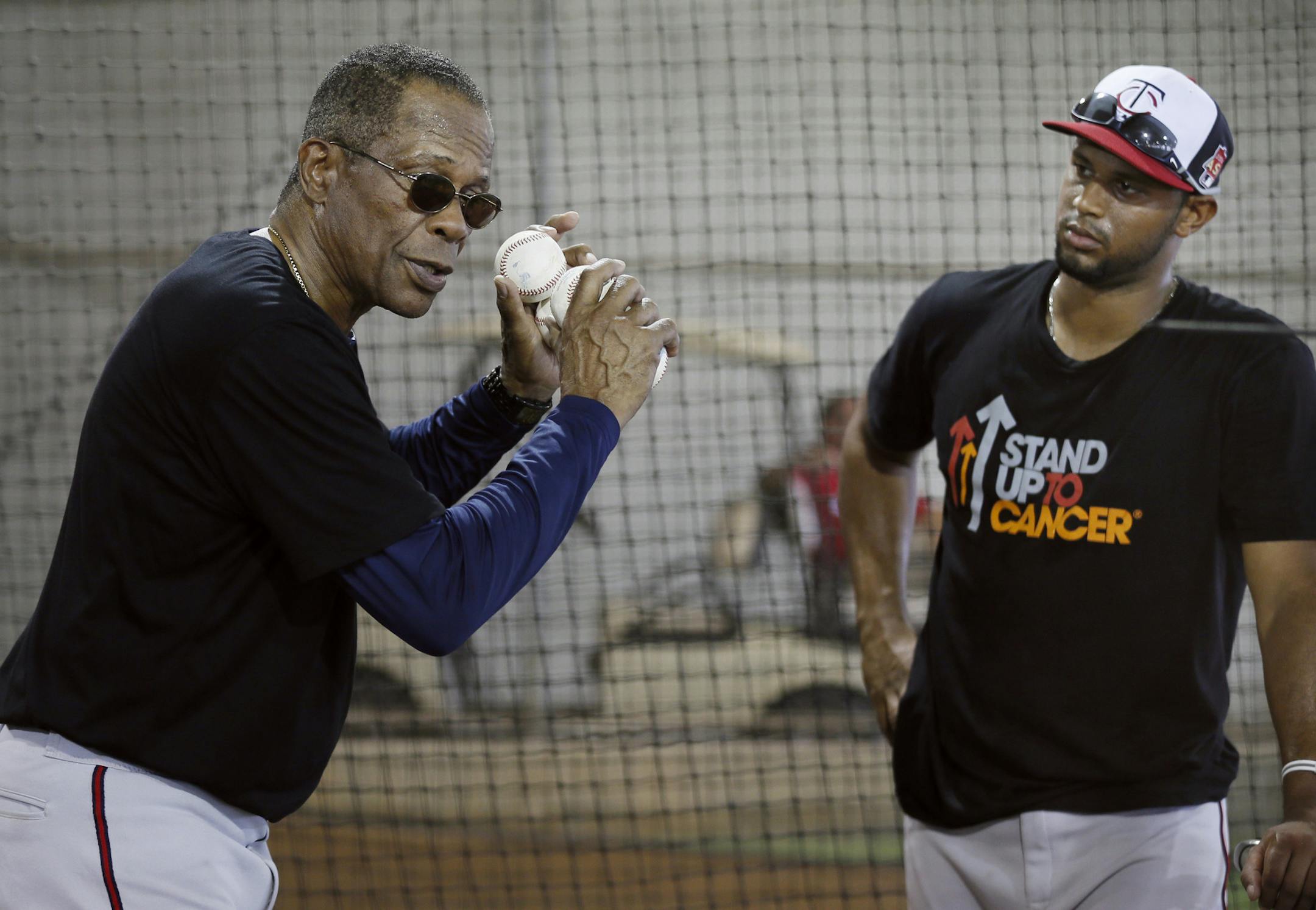 Twins hall of famer Rod Carew gave hitting instructions to Aaron Hicks during practice Saturday Feb 22. 2014 in Fort Myers, Florida at Lee County Sports Complex. ] JERRY HOLT jerry.holt@startribune.com Jerry Holt