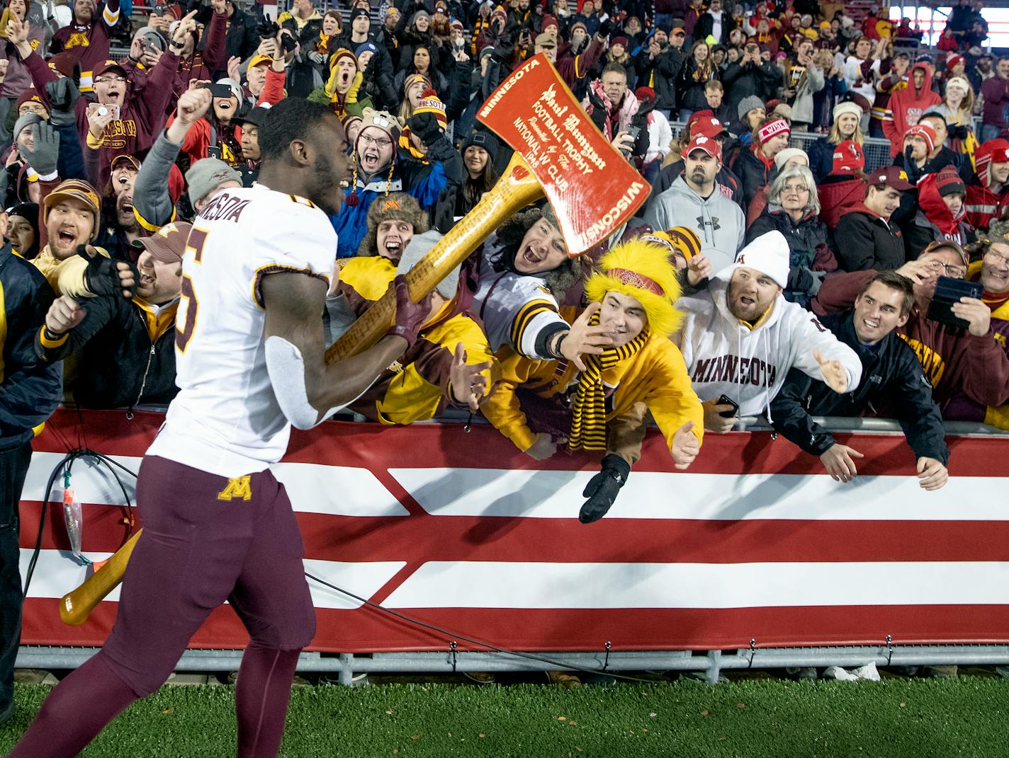 After 15 years Minnesota took back Paul Bunyan's Axe after beating Wisconsin 37-15 at Camp Randall Stadium. Tyler Johnson showed off the trophy to fans.