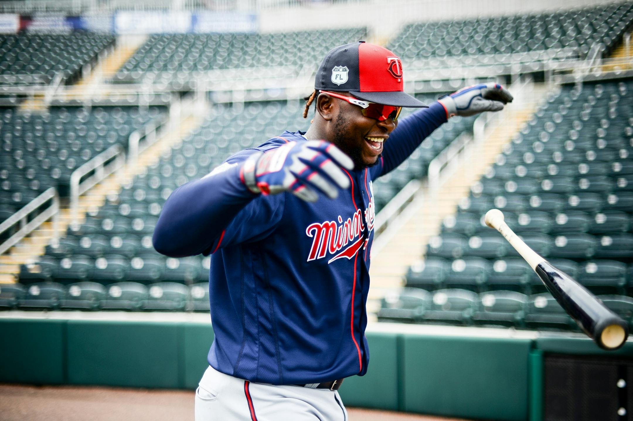 Minnesota Twins third baseman Miguel Sano (22) tossed his bat as he joked with a Twins staffer Tuesday.