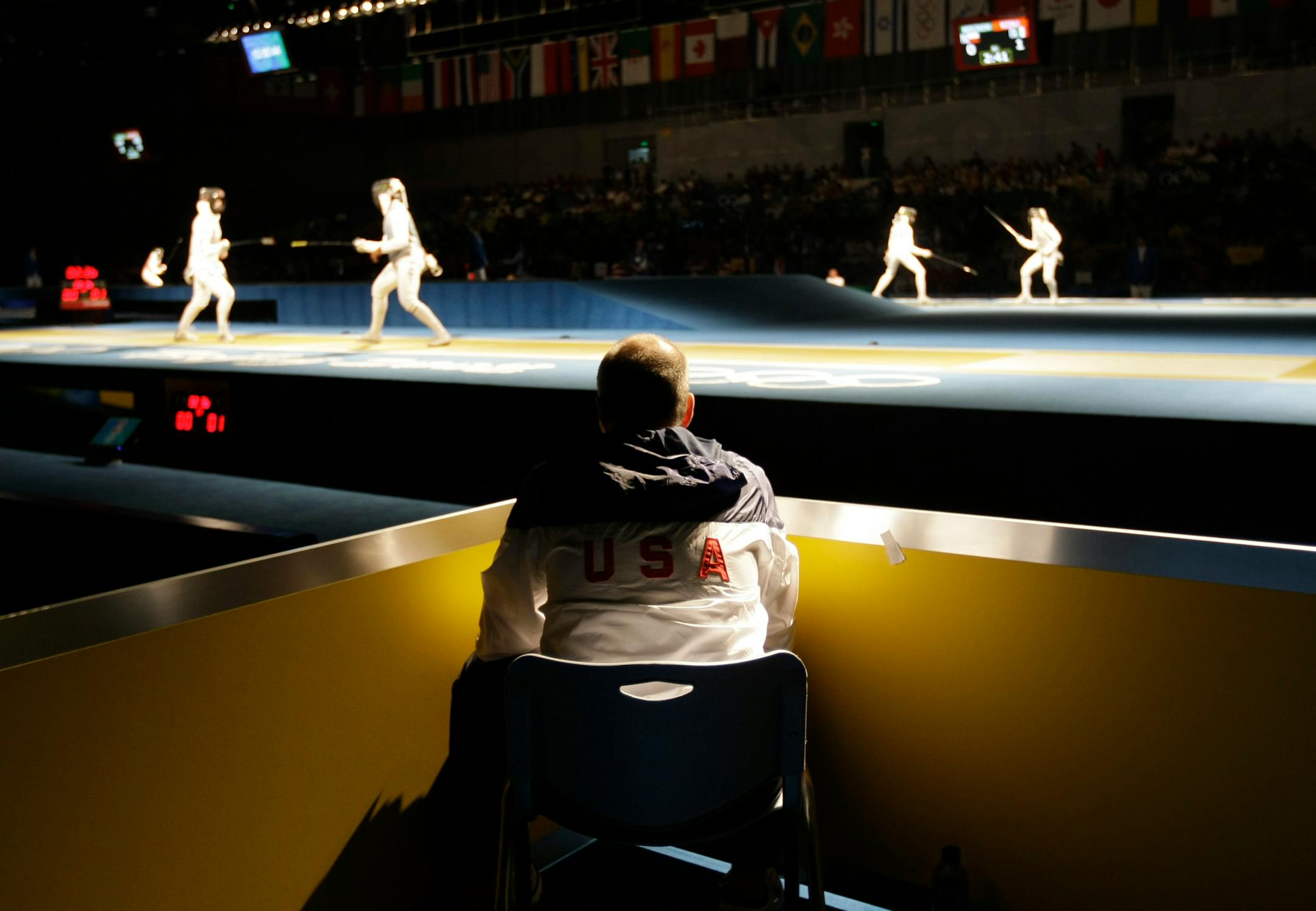 "Fencing tends to draw a little bit more of an eclectic group of people," said Pederson, watching a U.S. fencer compete.