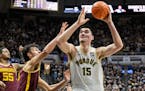 Purdue center Zach Edey drew 11 fouls on Gophers post players on Sunday.