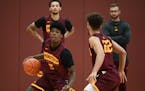 The Gophers' backcourt is again in good shape, with Marcus Carr (dribbling) and Gabe Kalscheur (defending) being rejoined by Payton Willis (back left)