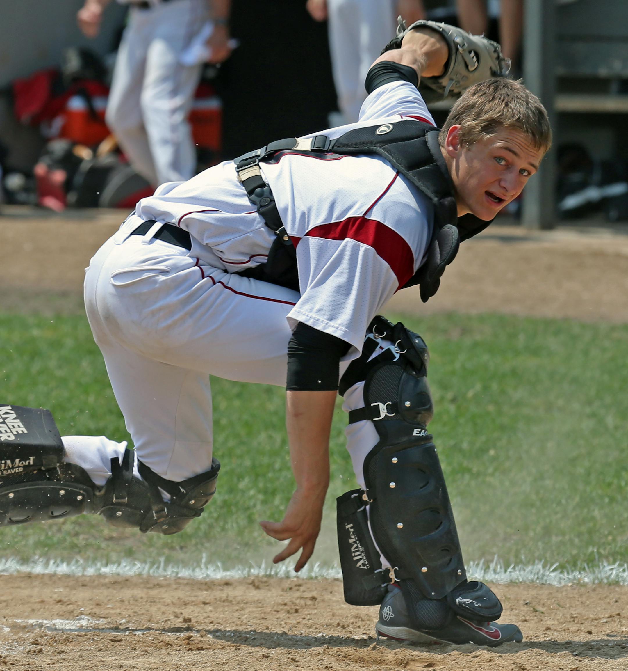 New Prague catcher Joe Heinz chased a ball during the Eden Prairie vs. New Prague baseball game, at Memorial Park in New Prague, on 5/31/14. New Prague was 2-19 last season and the town is fired up about this much-improved team going into the playoffs.] Bruce Bisping/Star Tribune bbisping@startribune.com Joe Heinz/roster. .