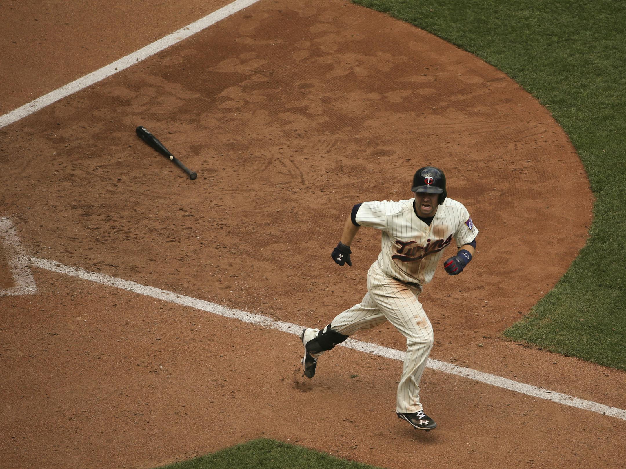 Minnesota Twins second baseman Brian Dozier shouted to the Twins' dugout as he headed for first after hitting a two run homer in the sixth inning Wednesday afternoon at Target Field. JEFF WHEELER ï jeff.wheeler@startribune.com The Twins swept the Baltimore Orioles with a 5-3 win Wednesday afternoon, July 8, 2015 at Target Field in Minneapolis. ORG XMIT: MIN1507081559460653 ORG XMIT: MIN1507201911461413