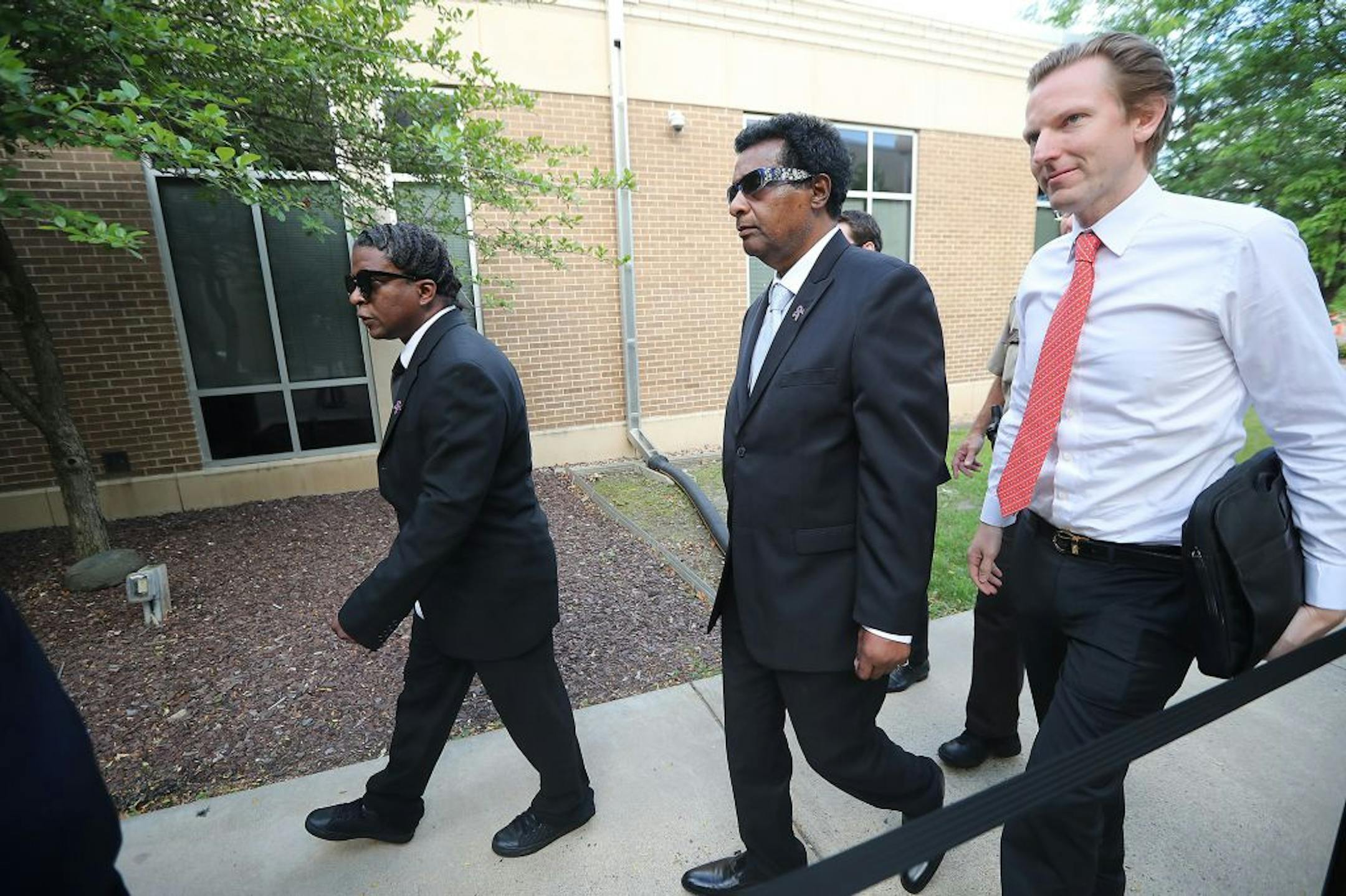 Prince's half-brother Alfred Jackson, center, made his way into the Carver County Justice Center on June 27, 2016 in Chaska, MN. Attorneys representing the potential heirs to Prince's estate met in court to discuss issues related to DNA testing of those making a claim to the late musician's music and millions.