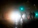 Pedestrians cross the street in downtown Minneapolis as thick fog rolls in on Wednesday.