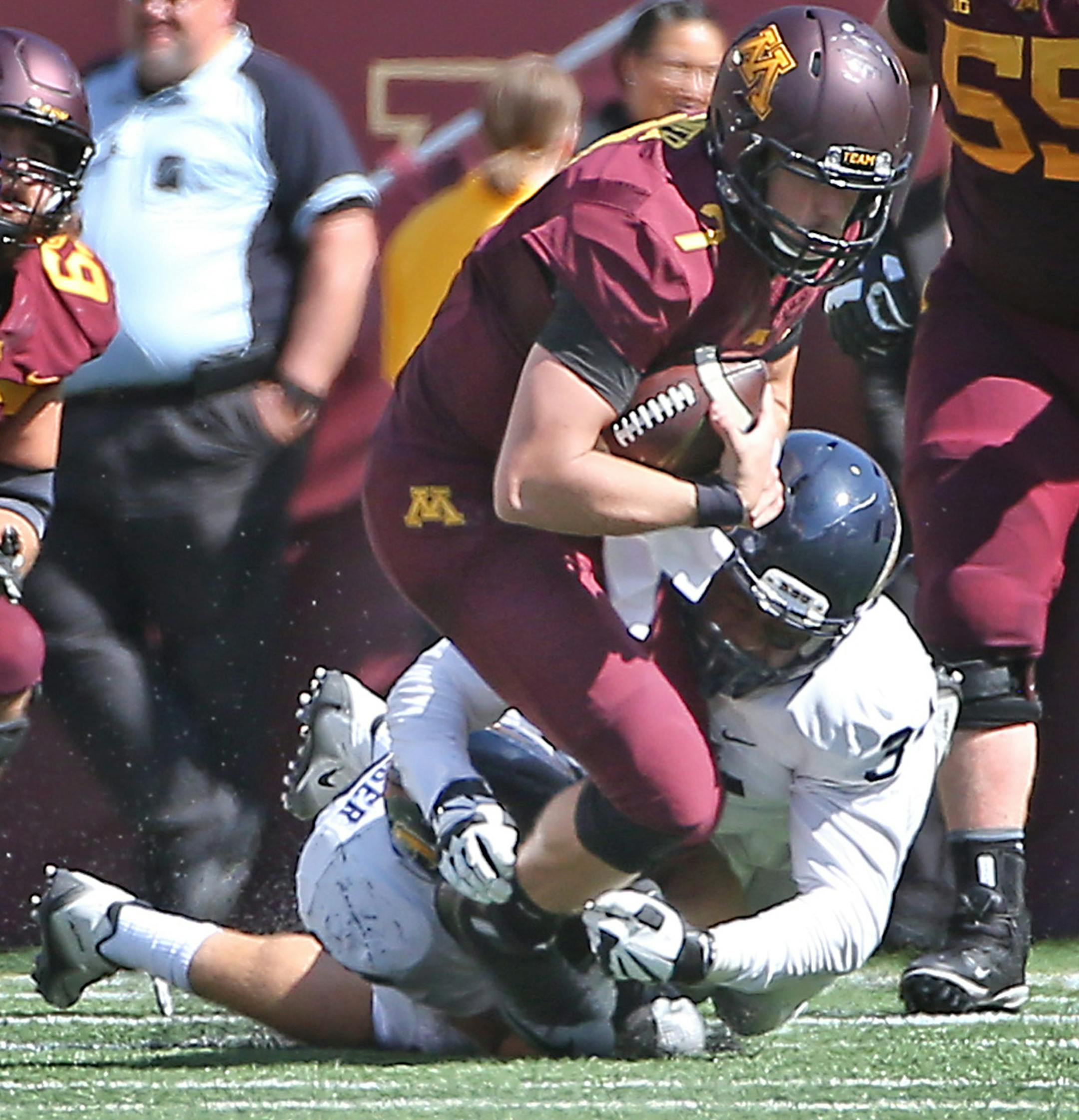 Minnesota's quarterback Mitch Leidner was sacked in the fourth quarter as the Gophers took on Kent State at TCF Bank Stadium, Saturday, September 19, 2015 in Minneapolis, MN. ] (ELIZABETH FLORES/STAR TRIBUNE) ELIZABETH FLORES &#x2022; eflores@startribune.com